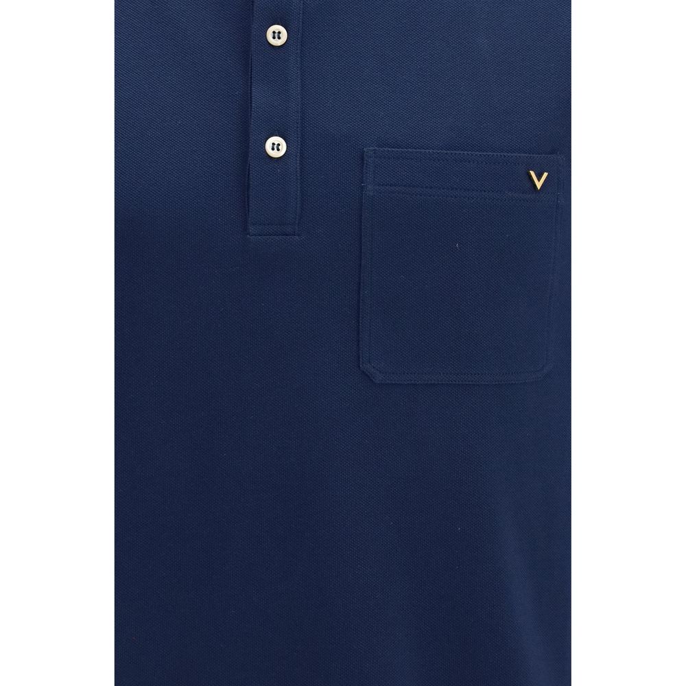 Indulge in the elegance of the Valentino Blue Cotton Polo Shirt, crafted from luxe cotton piqué for timeless sophistication and effortless style.