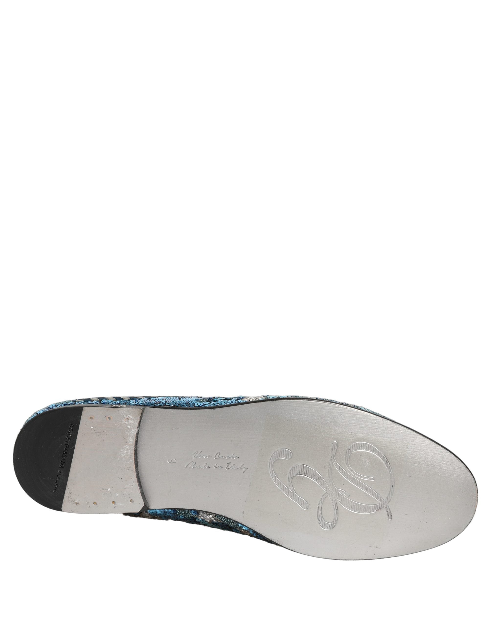 Elevate your style with Dolce & Gabbana Multicolor Embroidered Sequin Loafers, a masterpiece of Italian craftsmanship that embodies luxury and artistic allure.