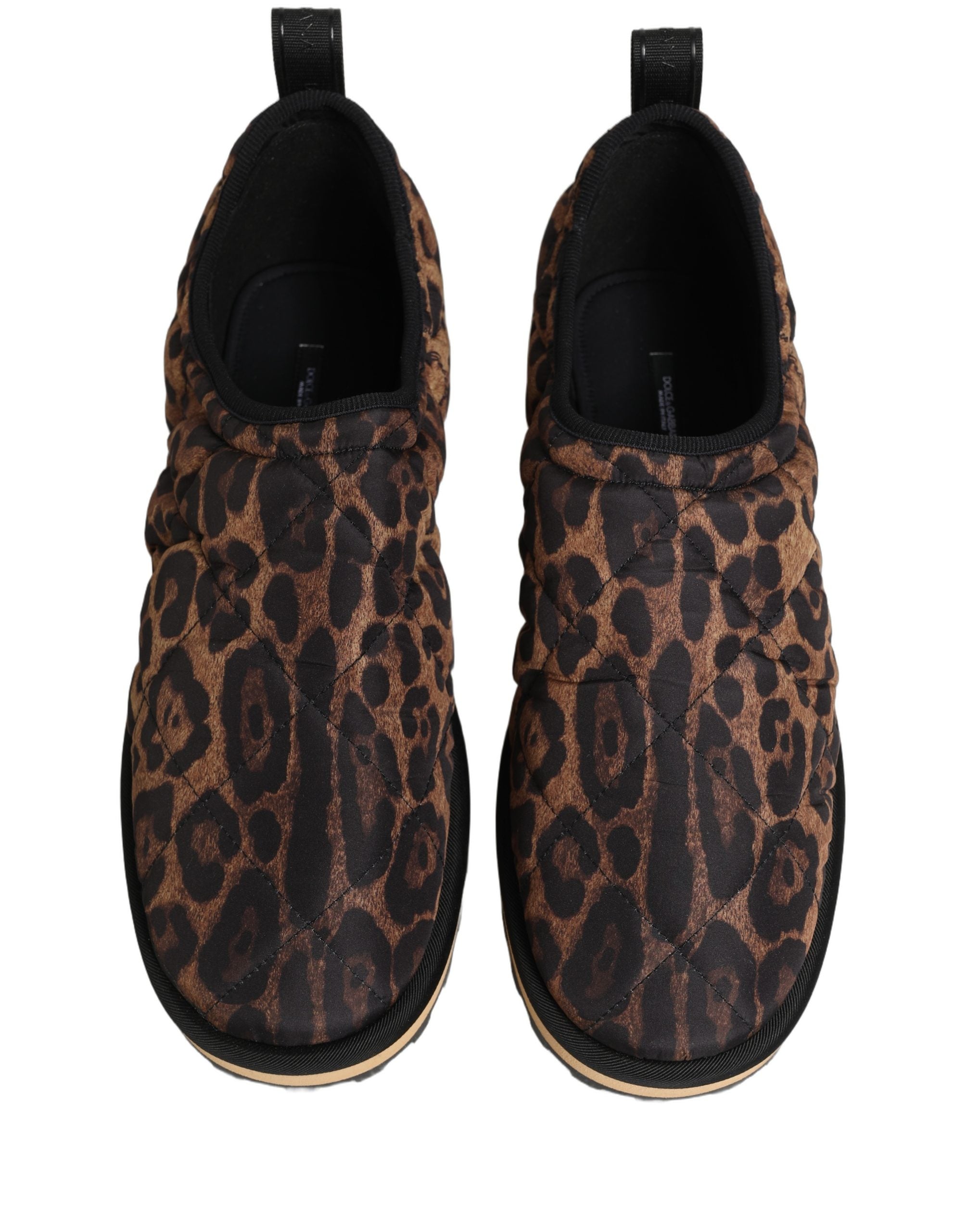 Indulge in the exquisite craftsmanship of Dolce & Gabbana's Brown Leopard Print Quilted Sneakers, where luxurious materials meet bold elegance for the discerning individual.