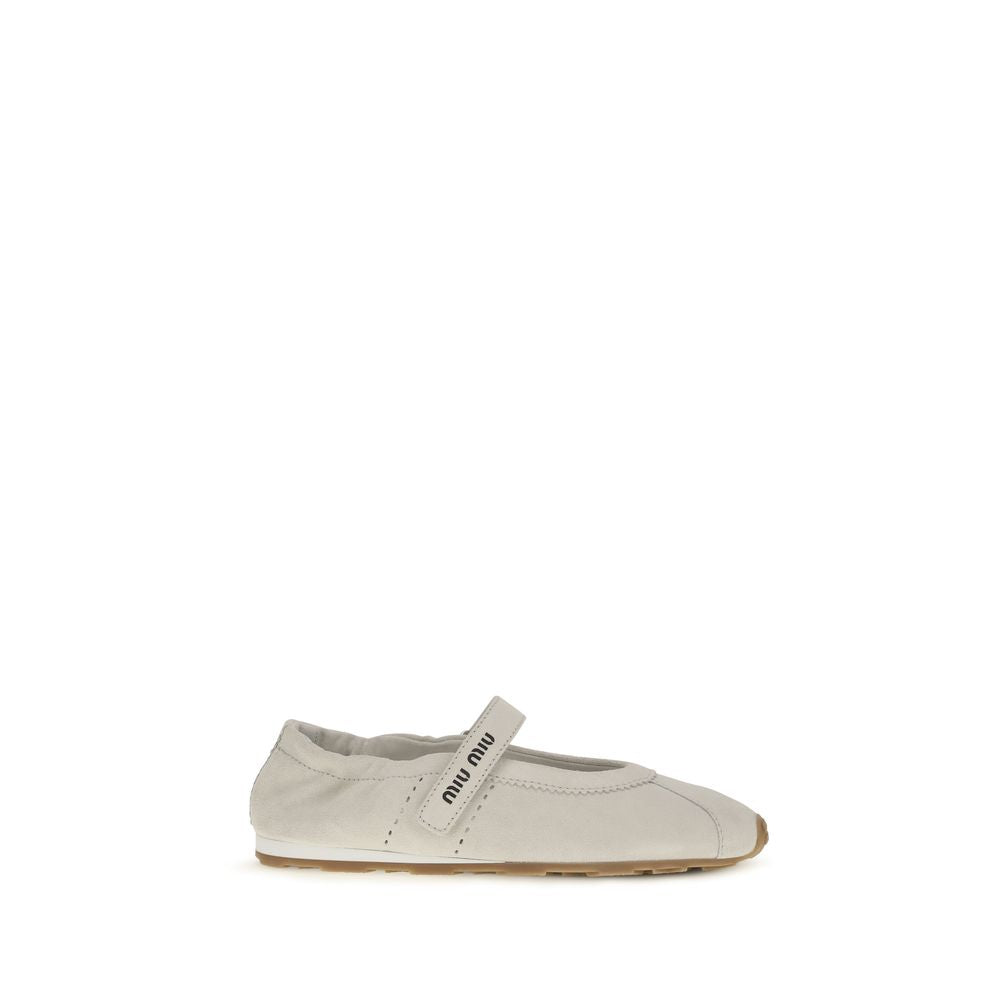 Experience the allure of Miu Miu's White Calf Leather Bos Taurus Ballet Flats, where exquisite craftsmanship meets luxurious comfort, perfect for every sophisticated occasion.
