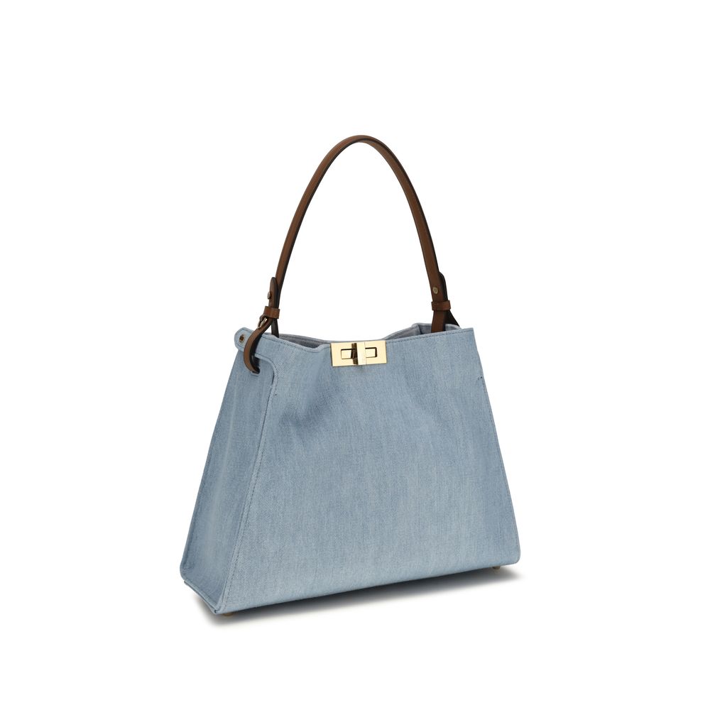 Indulge in the Fendi Blue Calf Leather Bos Taurus Shoulder Bag, where exquisite craftsmanship meets modern elegance, perfect for the discerning individual.