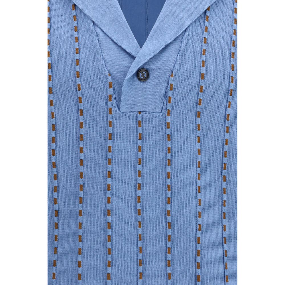 Indulge in the Fendi Blue Cotton Polo Shirt from the AW26 collection, a masterpiece of 100% cotton that seamlessly blends luxury with effortless elegance.