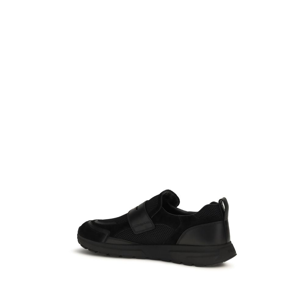Elevate your style with Prada's Black Calf Leather Bos Taurus Athletic Sneakers, where luxurious craftsmanship meets contemporary elegance for the discerning individual.
