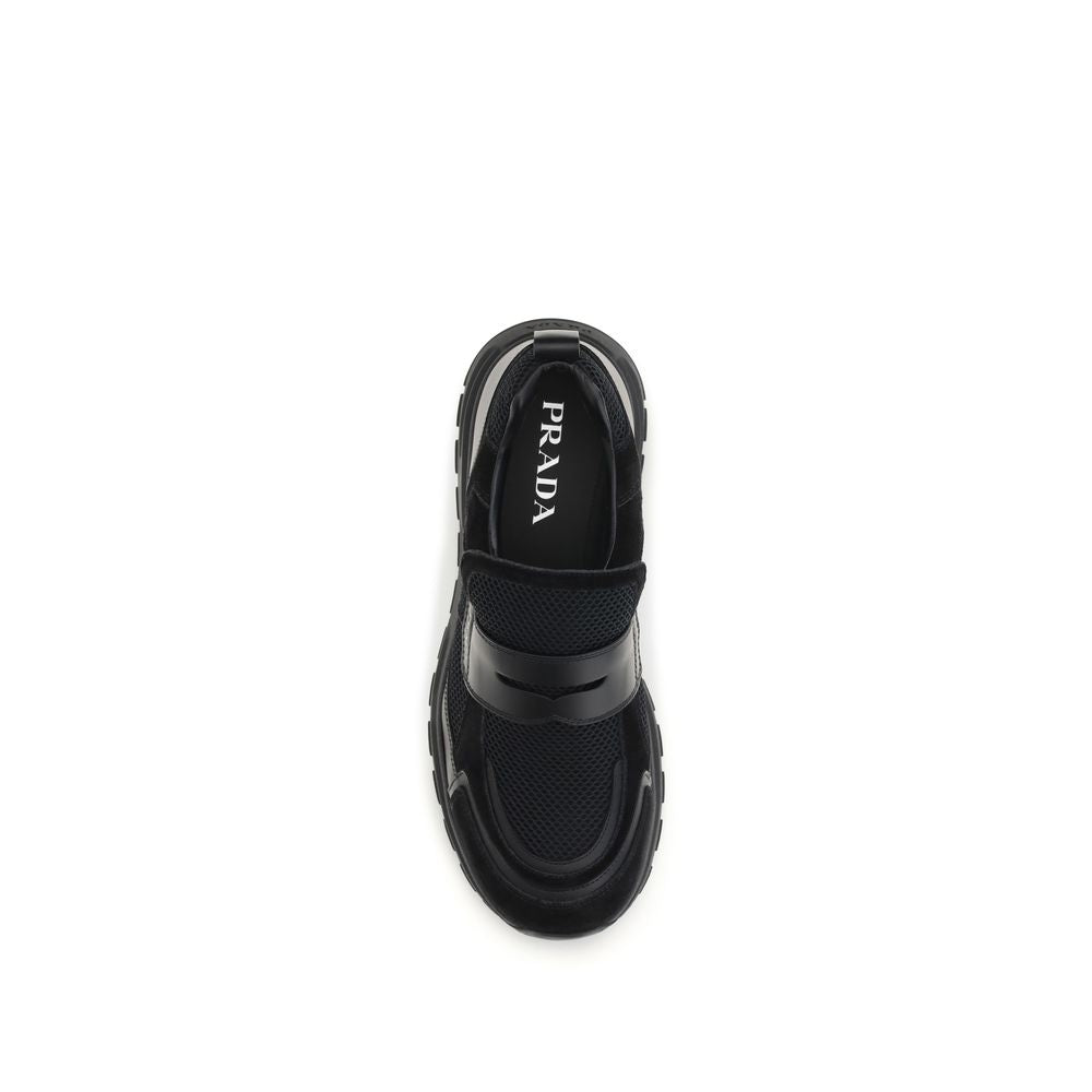 Discover the Prada Black Calf Leather Bos Taurus Athletic Sneakers, where exquisite craftsmanship meets modern elegance, perfect for the discerning individual.