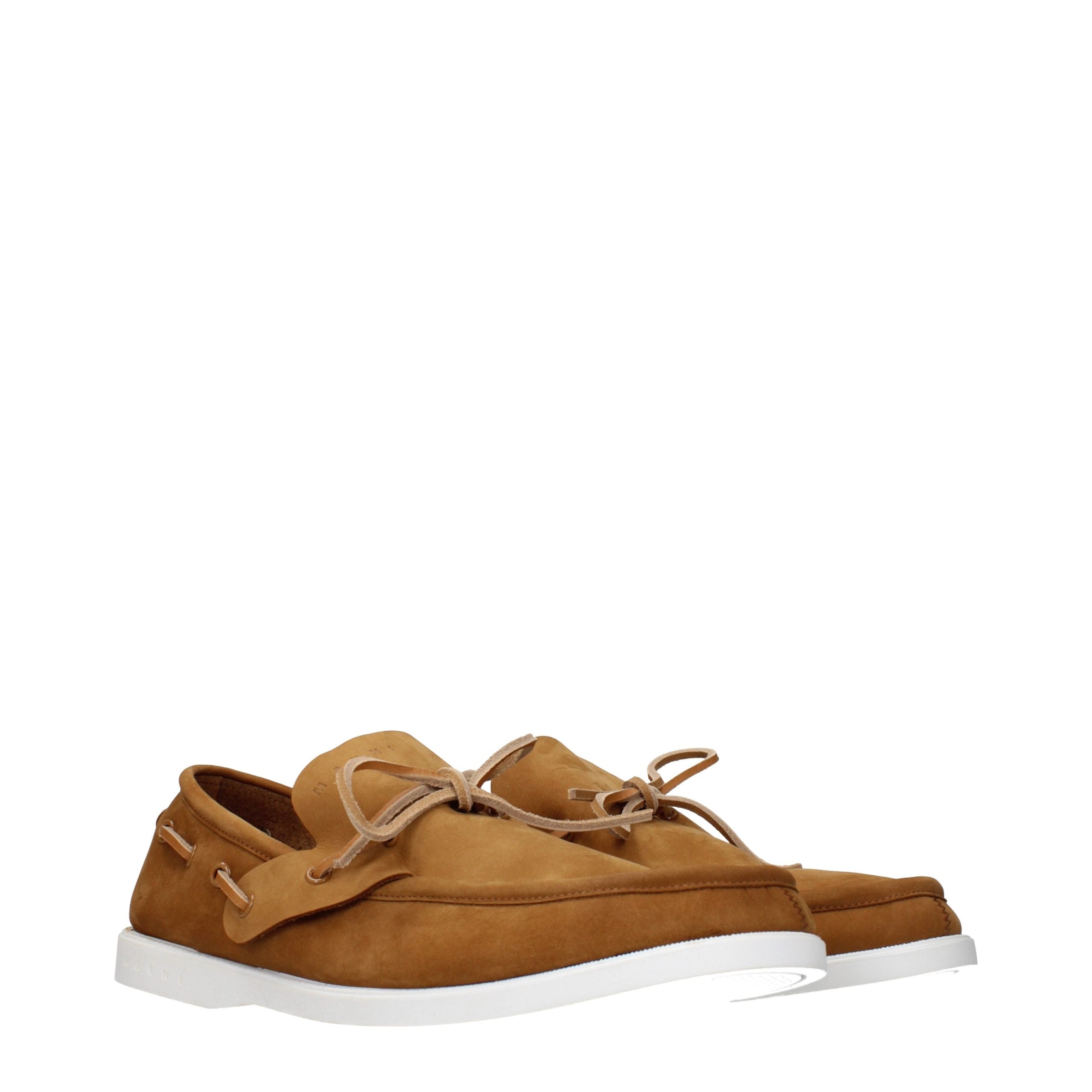 Indulge in the exquisite Marni Brown Leather Slip-On Loafers, where sumptuous suede meets timeless elegance, perfect for the discerning individual who values luxury.