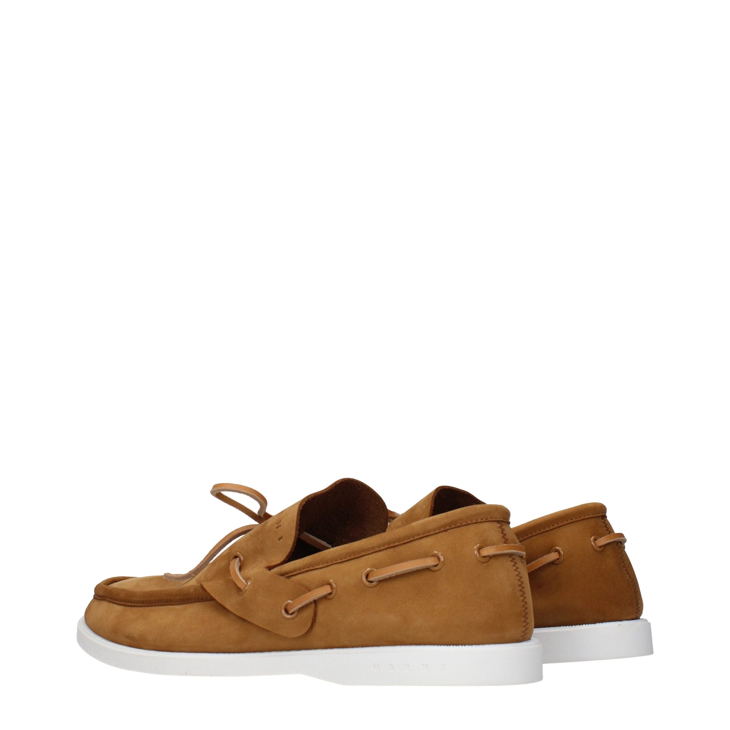 Indulge in the exquisite Marni Brown Leather Slip-On Loafers, where sumptuous suede meets timeless elegance, elevating your style with effortless sophistication.