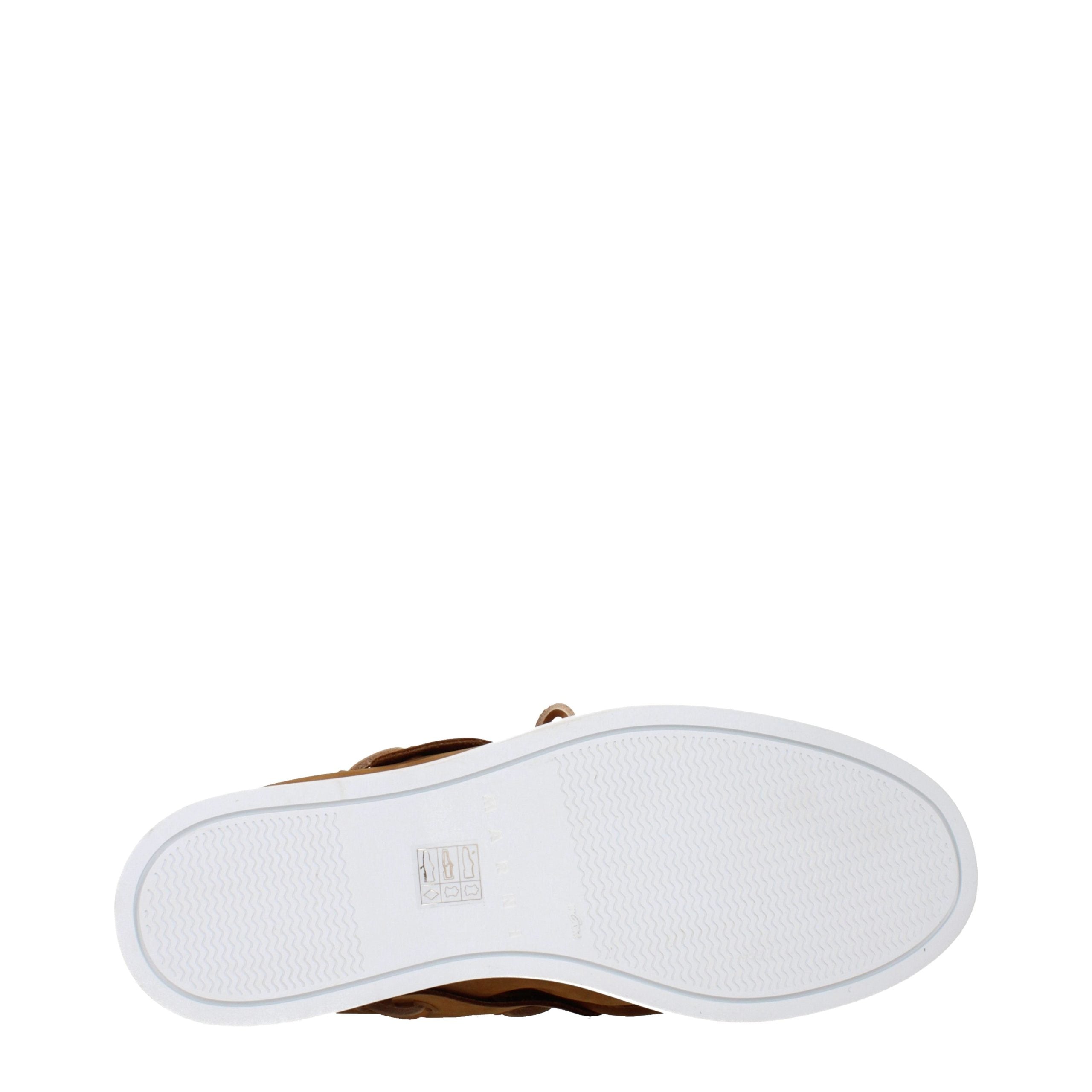 Elevate your style with Marni Brown Leather Slip-On Loafers, a masterpiece of sumptuous suede and refined craftsmanship, embodying timeless elegance and effortless luxury.