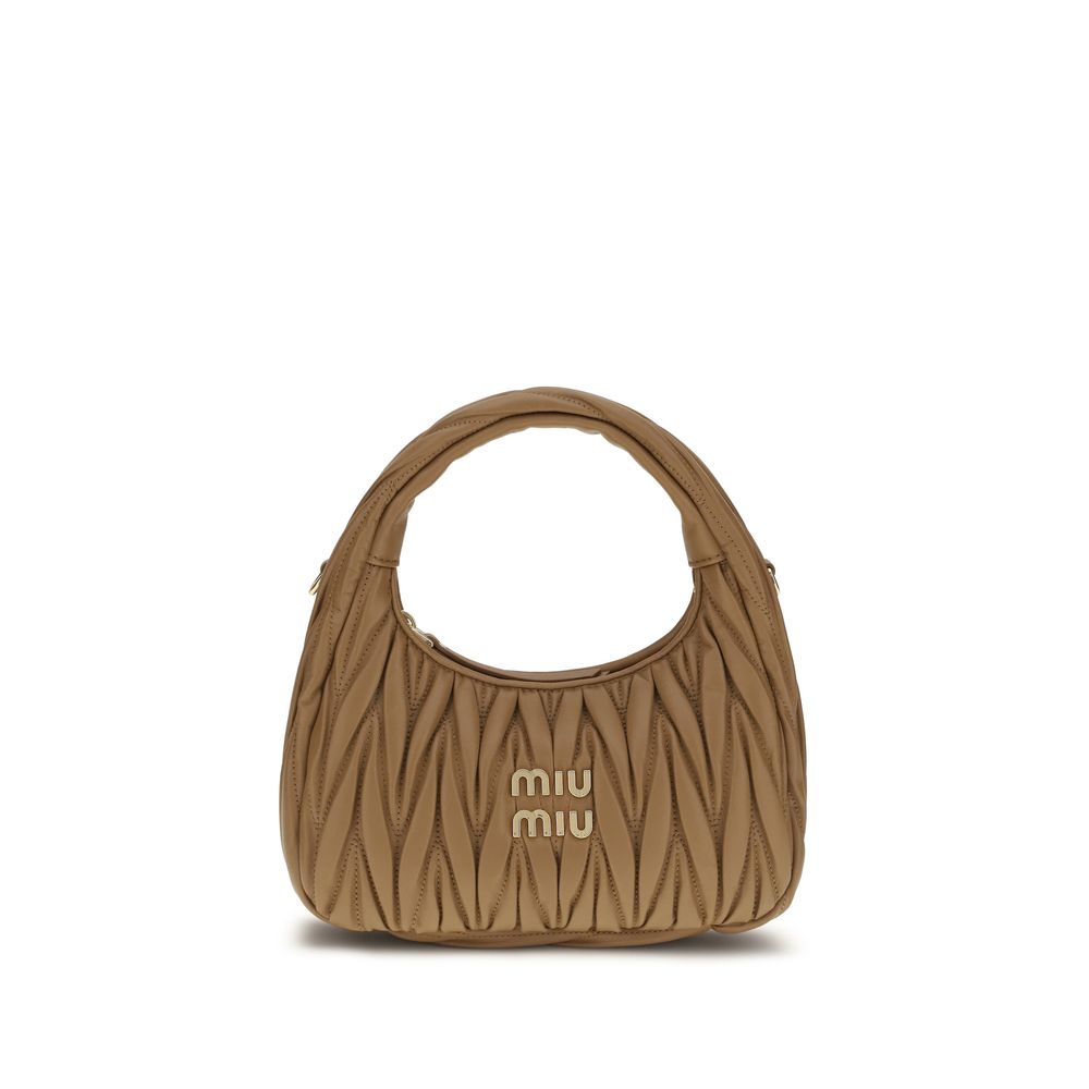 Discover the Miu Miu Beige Lamb Ovis Aries Shoulder Bag, a luxurious blend of exquisite craftsmanship and timeless elegance, perfect for the discerning individual.