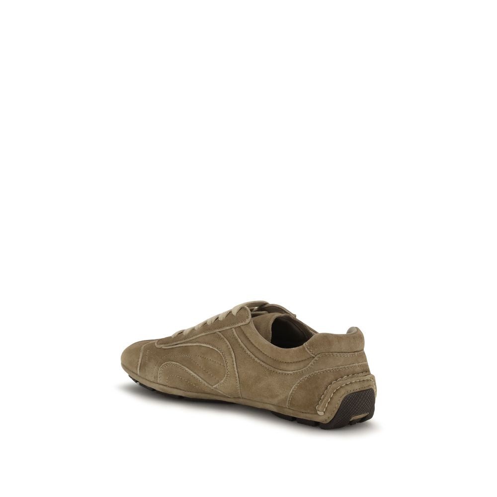 Experience the allure of Prada's Brown Calf Leather Bos Taurus Athletic Sneakers, where exquisite craftsmanship meets timeless elegance for the discerning individual.