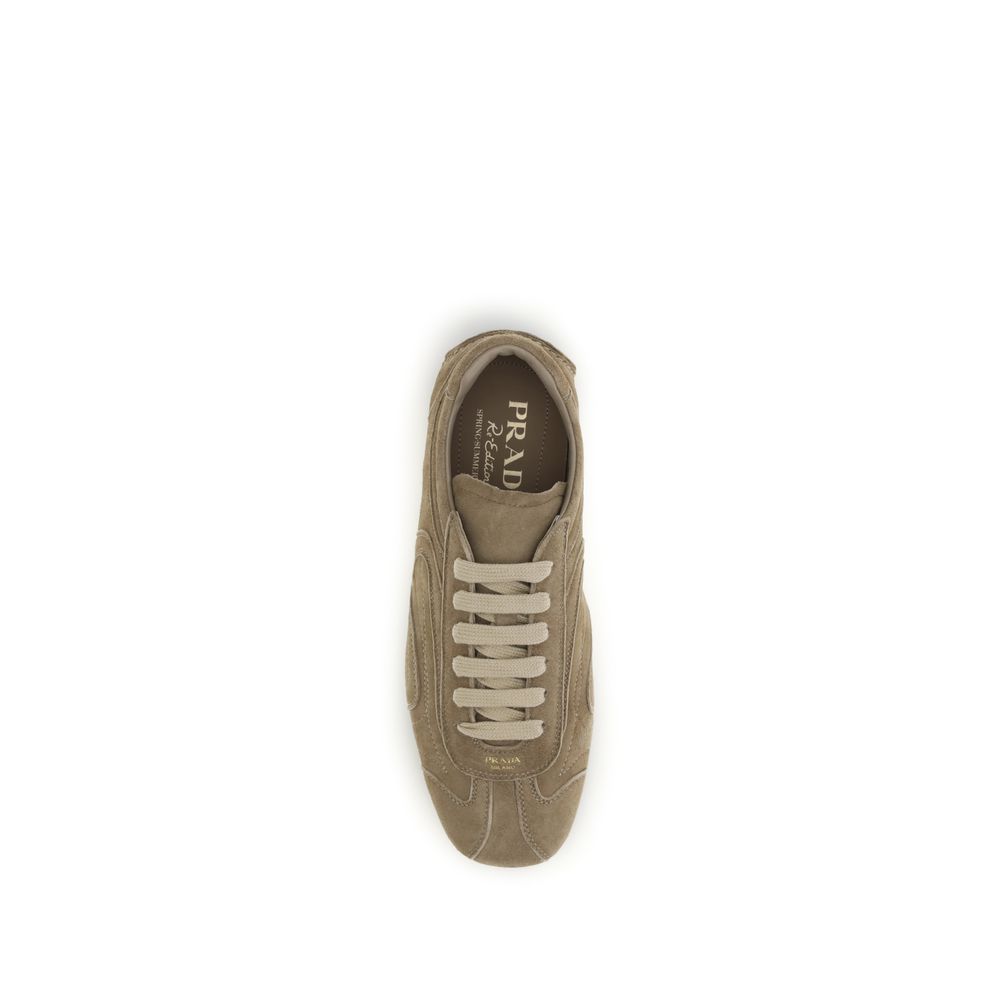 Experience the exquisite craftsmanship of Prada's Brown Calf Leather Bos Taurus Athletic Sneakers, where retro charm meets modern luxury for the discerning individual.