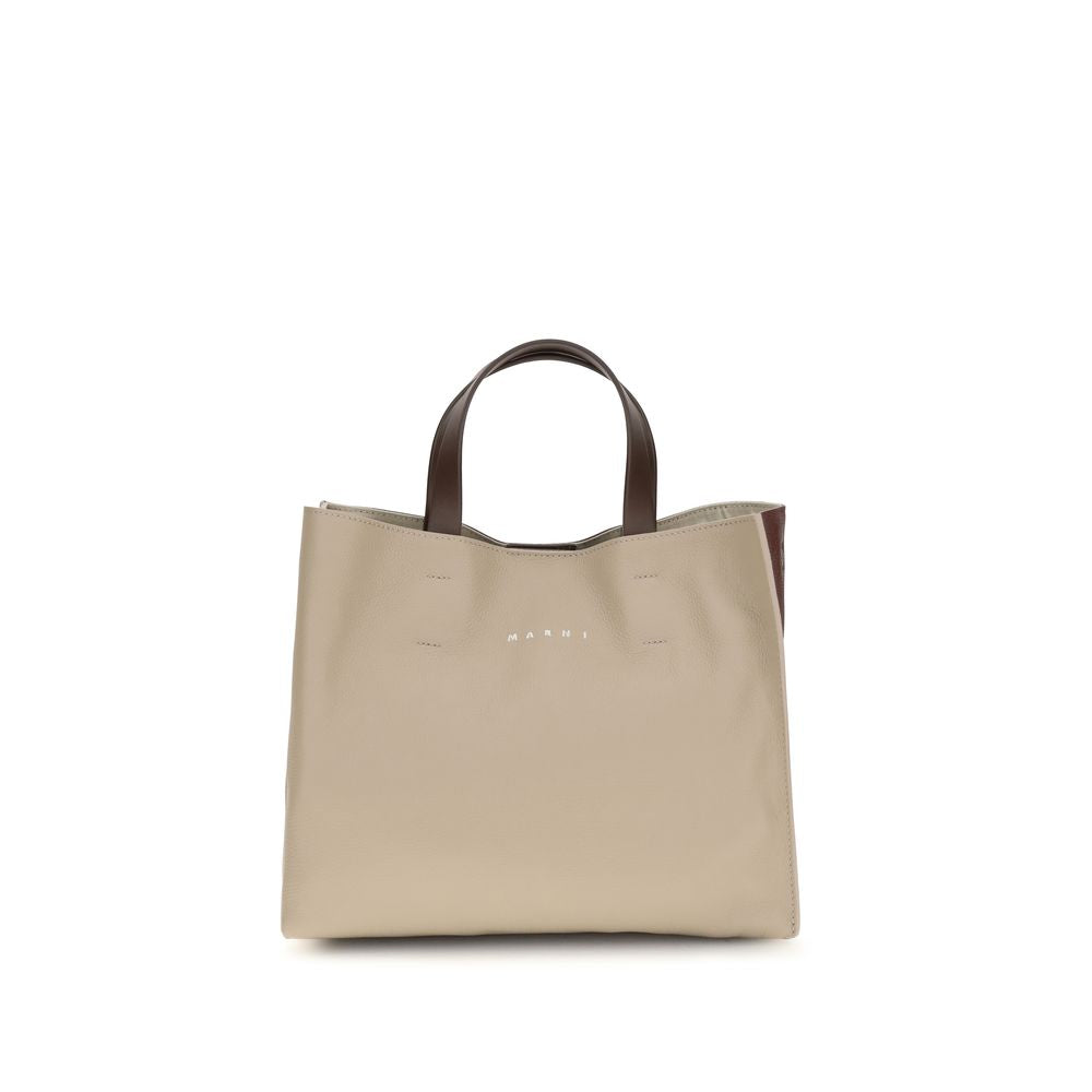 Elevate your style with the Marni Beige Calf Leather Bos Taurus Shoulder Bag, a masterpiece of artisanal luxury, perfect for the discerning individual who cherishes sophistication.