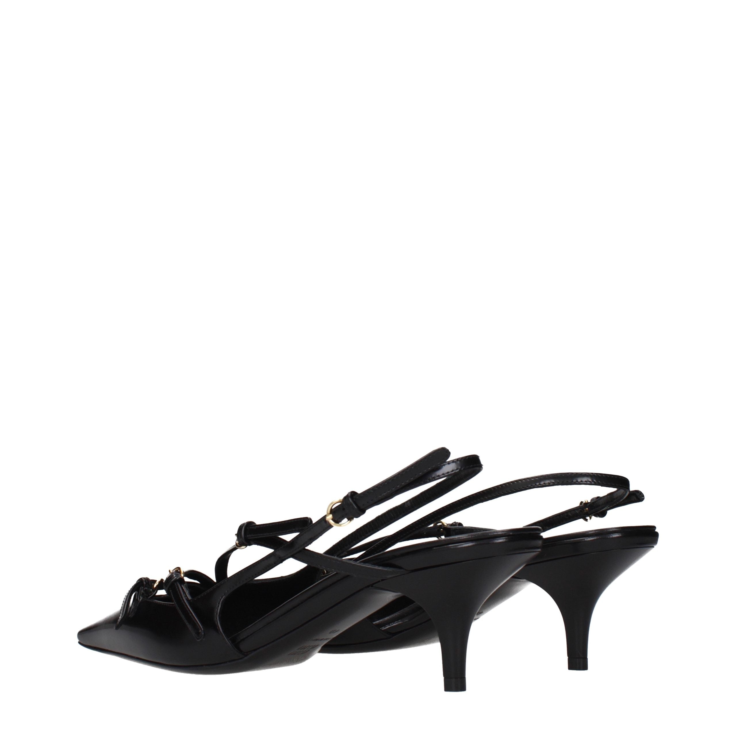 Experience the allure of Miu Miu Black Leather High Heel Pumps, where exquisite craftsmanship meets timeless elegance, perfect for the discerning individual.