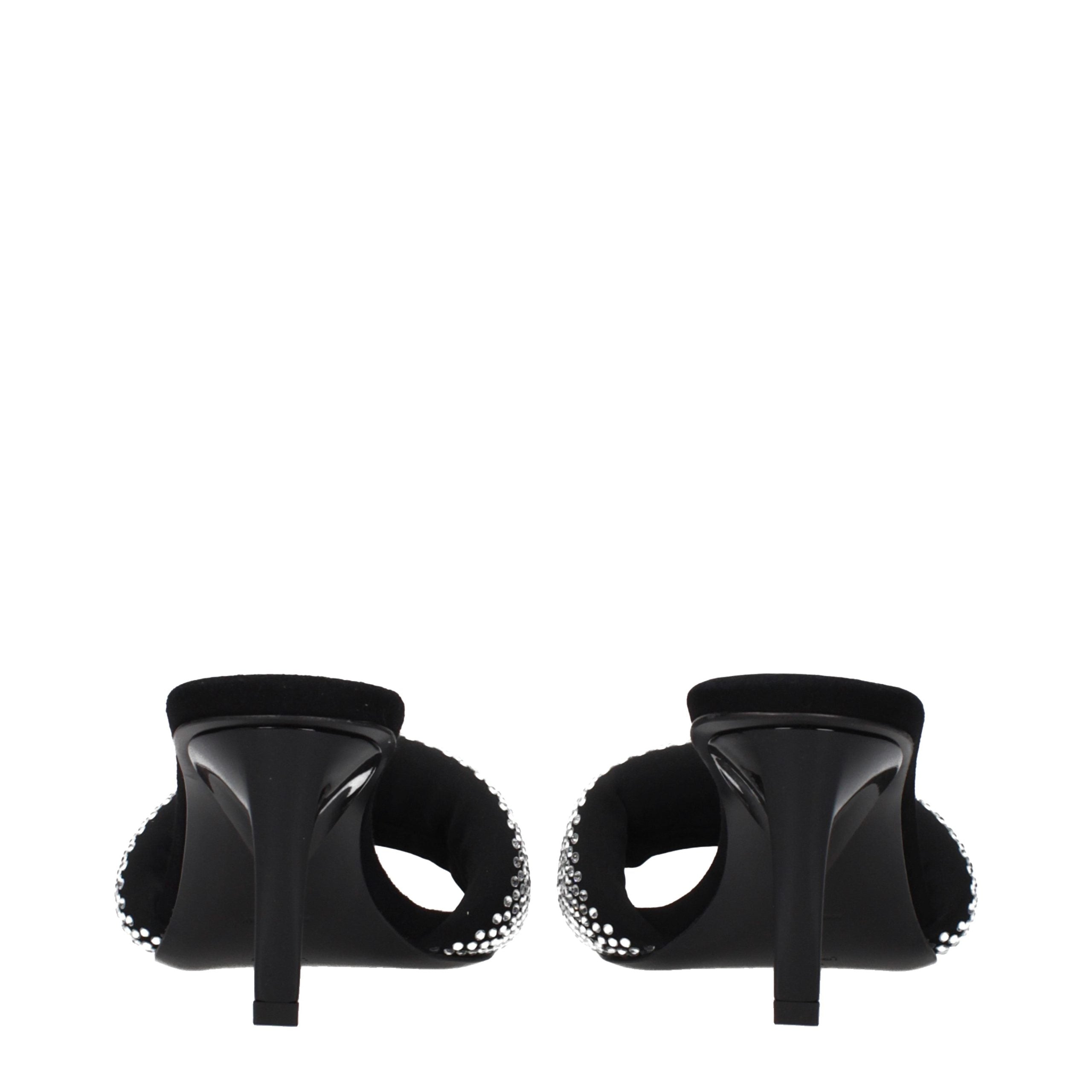 Step into the realm of elegance with Prada Black Fabric Stiletto Heel Sandals, where exquisite craftsmanship meets bold sophistication for the discerning connoisseur.