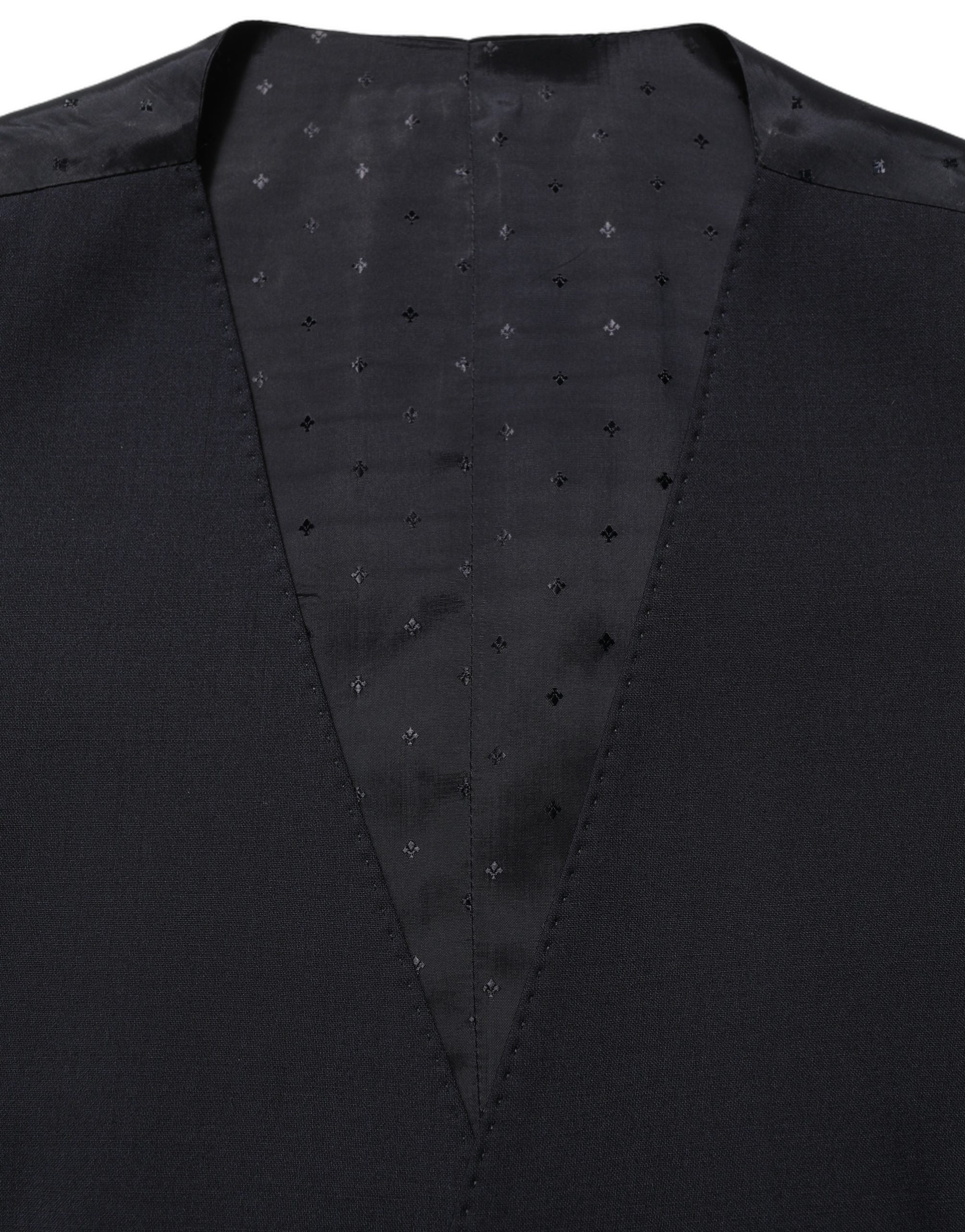 Indulge in the exquisite Dolce & Gabbana Black Wool Slim Fit Formal 3 Piece Suit, a testament to Italian craftsmanship that elevates your style with timeless elegance.