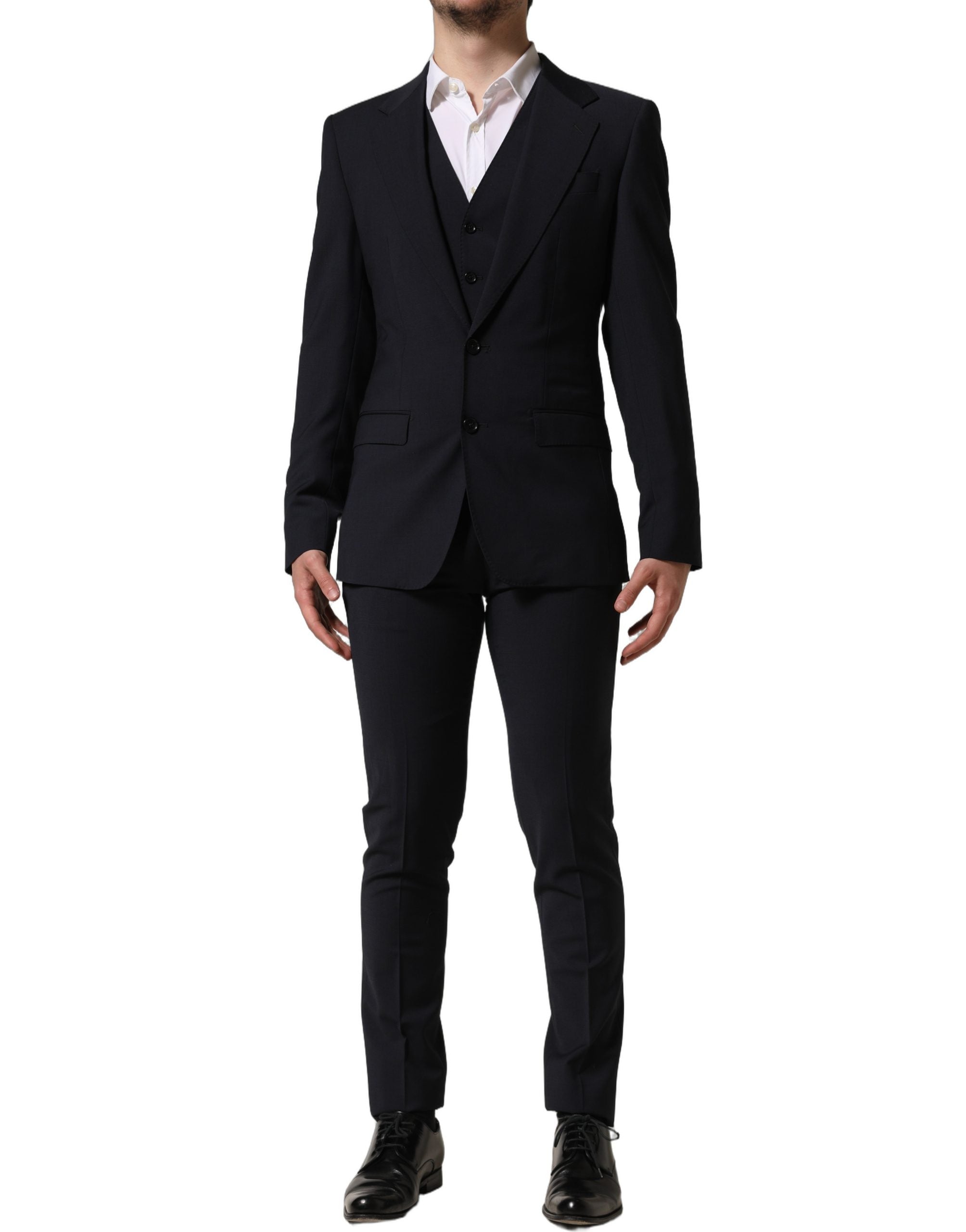Discover the Dolce & Gabbana Black Wool Slim Fit Formal 3 Piece Suit, a testament to Italian craftsmanship that embodies sophistication and timeless elegance.