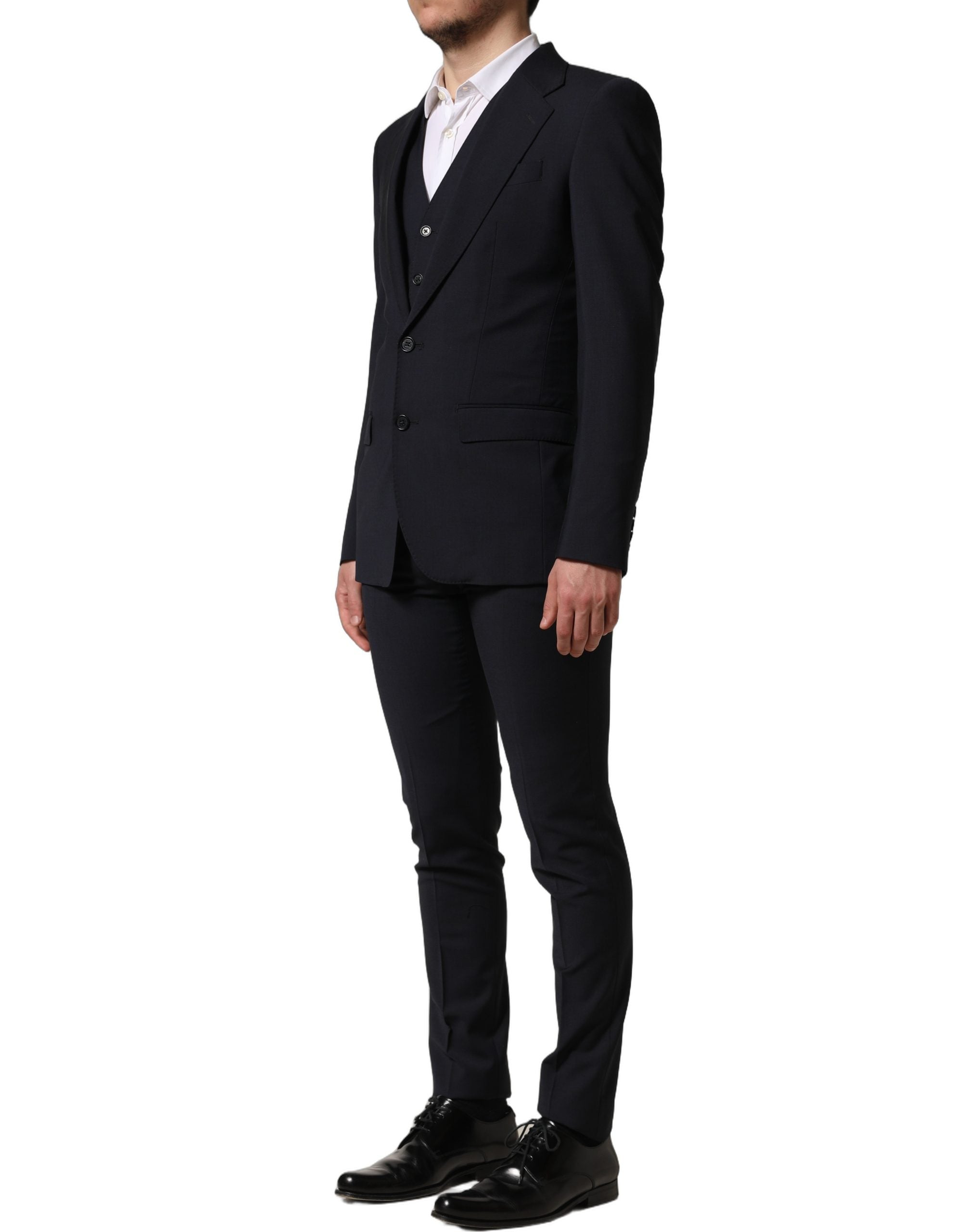 Indulge in the elegance of the Dolce & Gabbana Black Wool Slim Fit Formal 3 Piece Suit, a testament to Italian craftsmanship that redefines sophistication and allure.