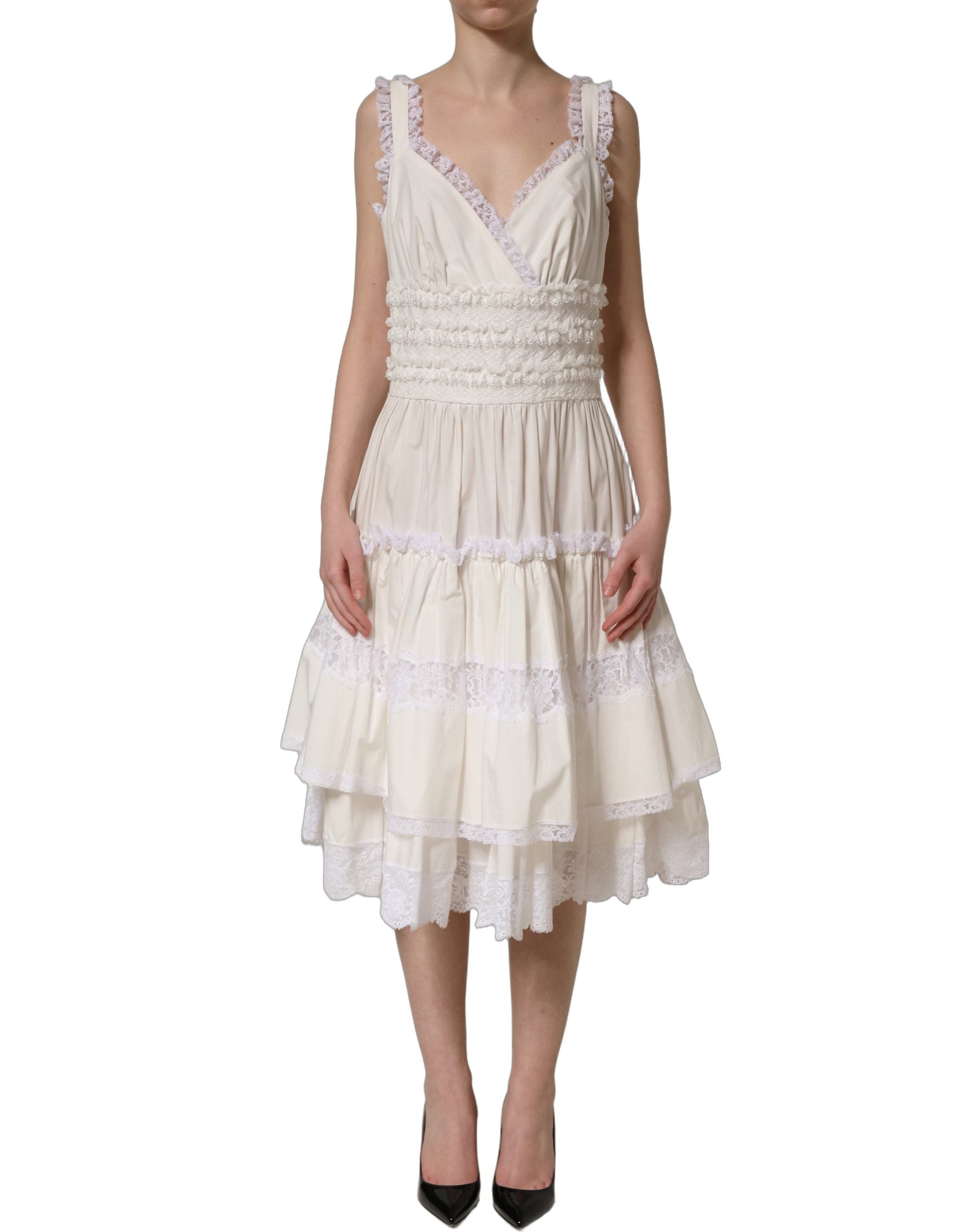 Experience the allure of the Dolce & Gabbana White Cotton Poplin Ruffled Midi Dress, a masterpiece of Italian craftsmanship that embodies timeless luxury and sophistication.