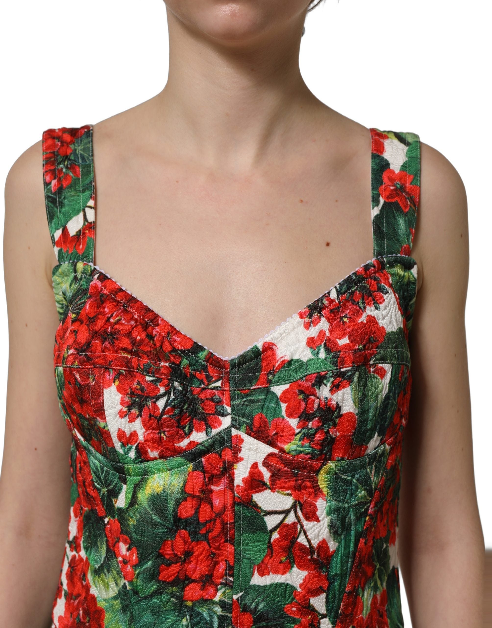 Indulge in the exquisite allure of the Dolce & Gabbana Multicolor Geranium Print A-line Mini Dress, where luxury craftsmanship meets vibrant elegance for unforgettable moments.