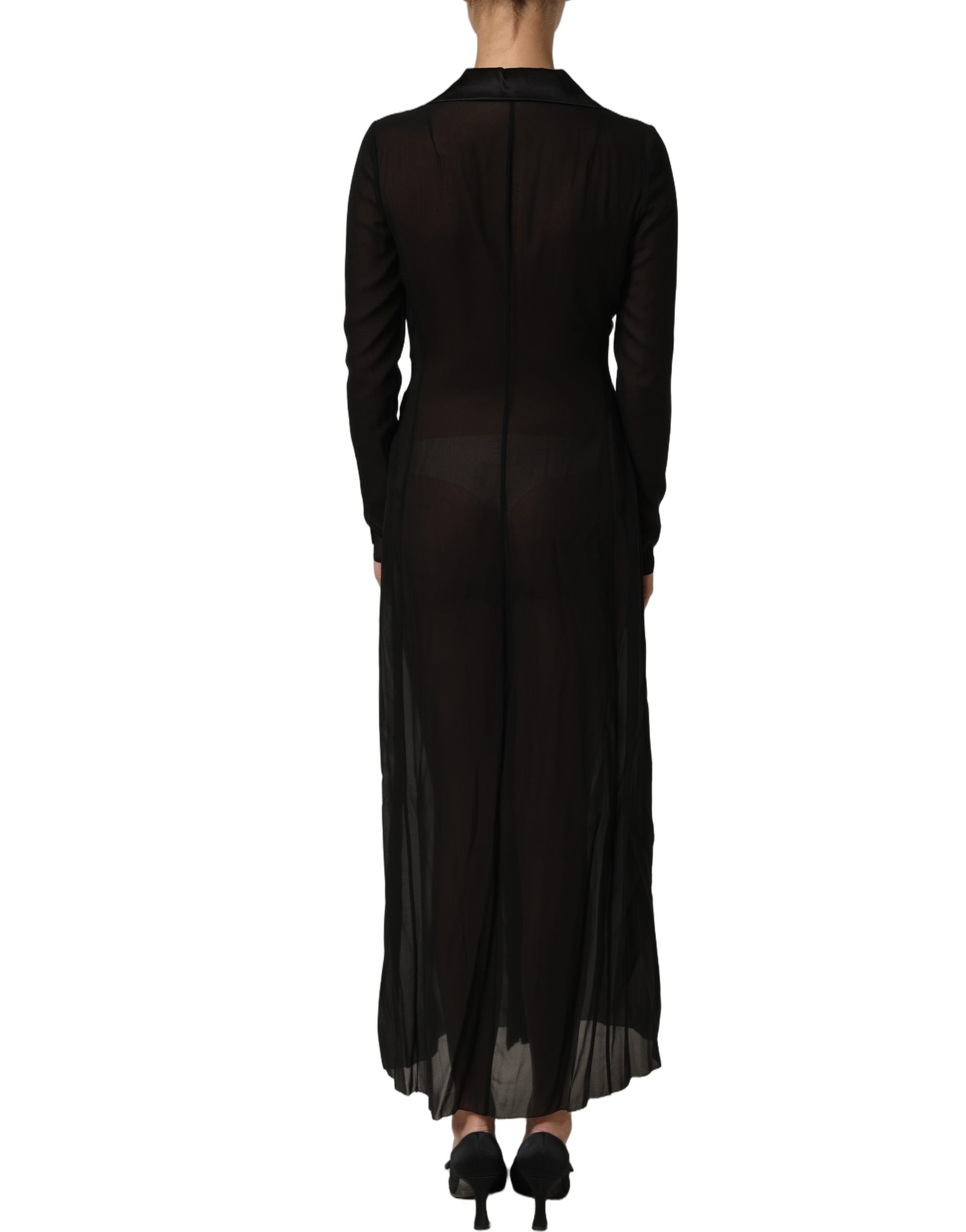 Experience the exquisite allure of the Dolce & Gabbana Black Silk Sheer Chiffon Long Maxi Dress, a testament to Italian craftsmanship and timeless elegance.