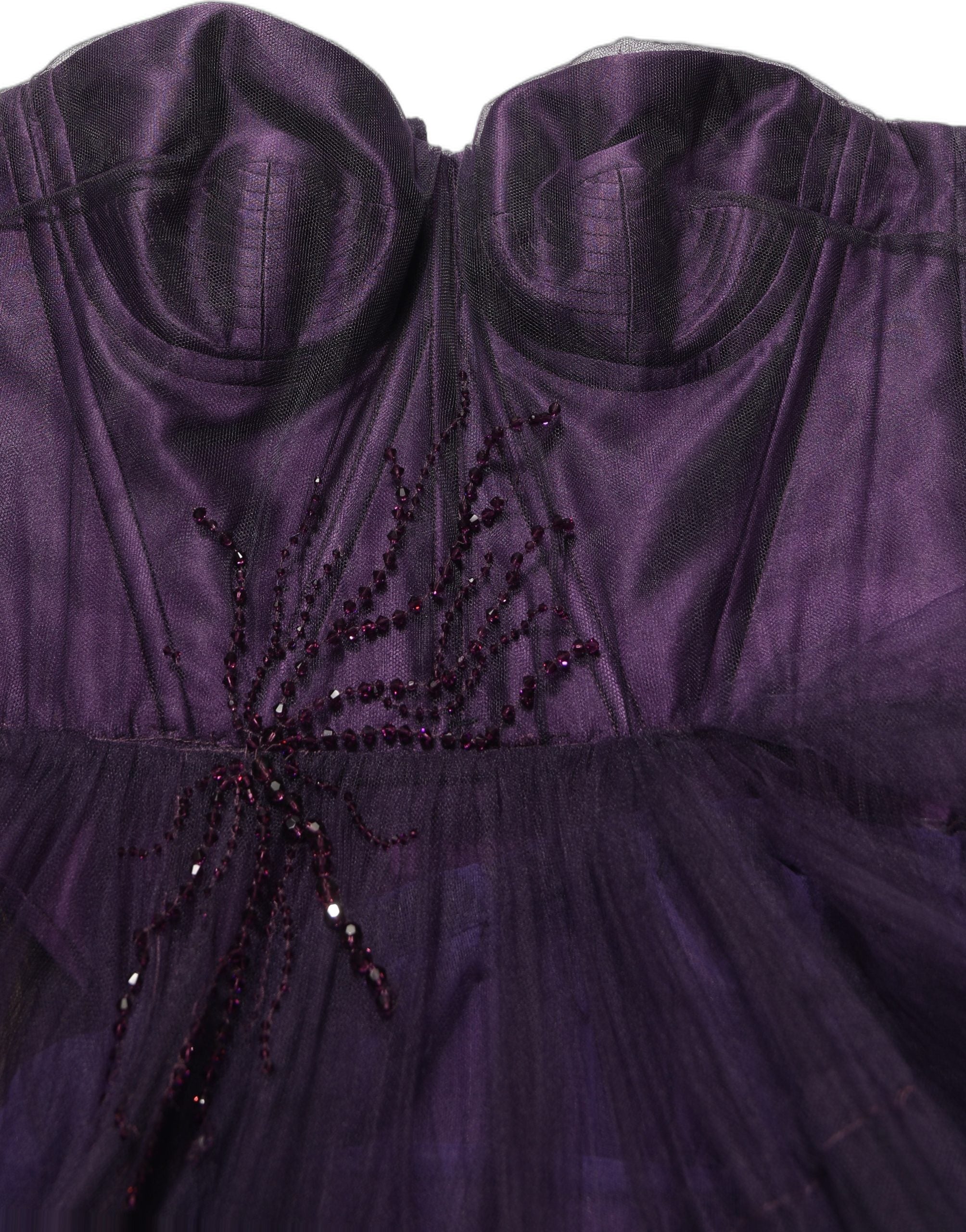 Experience the allure of the Dolce & Gabbana Purple Tiered Tulle Silk Long Gown, a masterpiece of Italian craftsmanship that embodies luxury and sophistication for unforgettable moments.