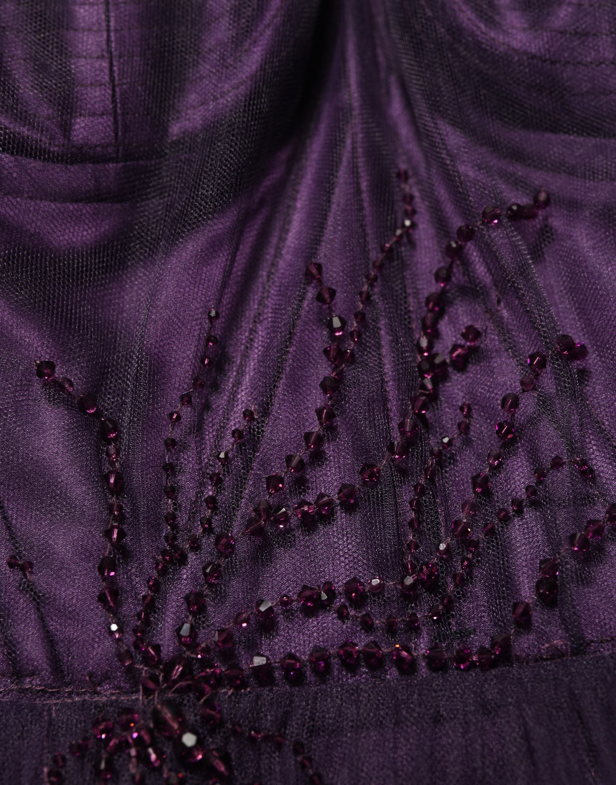 Experience the allure of the Dolce & Gabbana Purple Tiered Tulle Silk Long Gown, a masterpiece of Italian craftsmanship that redefines elegance and sophistication.