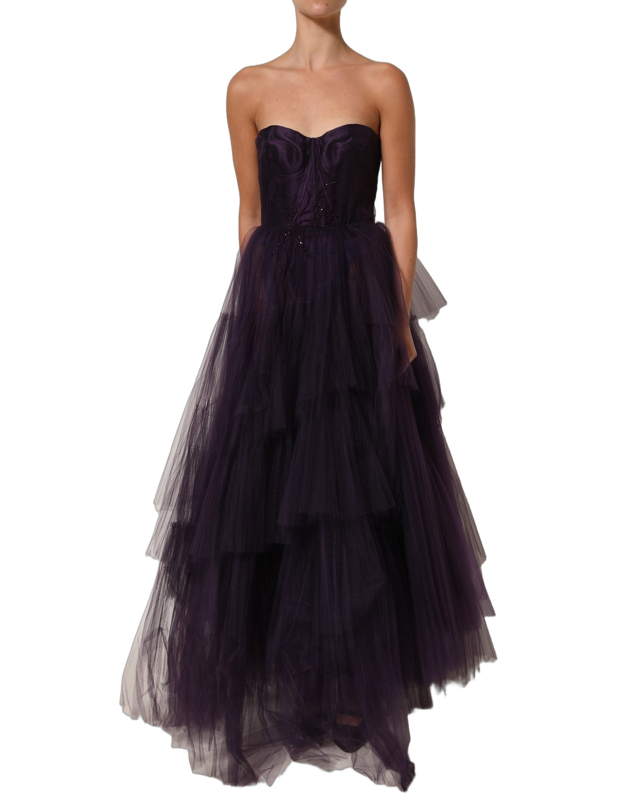 Discover the allure of the Dolce & Gabbana Purple Tiered Tulle Silk Long Gown, a masterpiece of Italian craftsmanship that embodies elegance and sophistication.