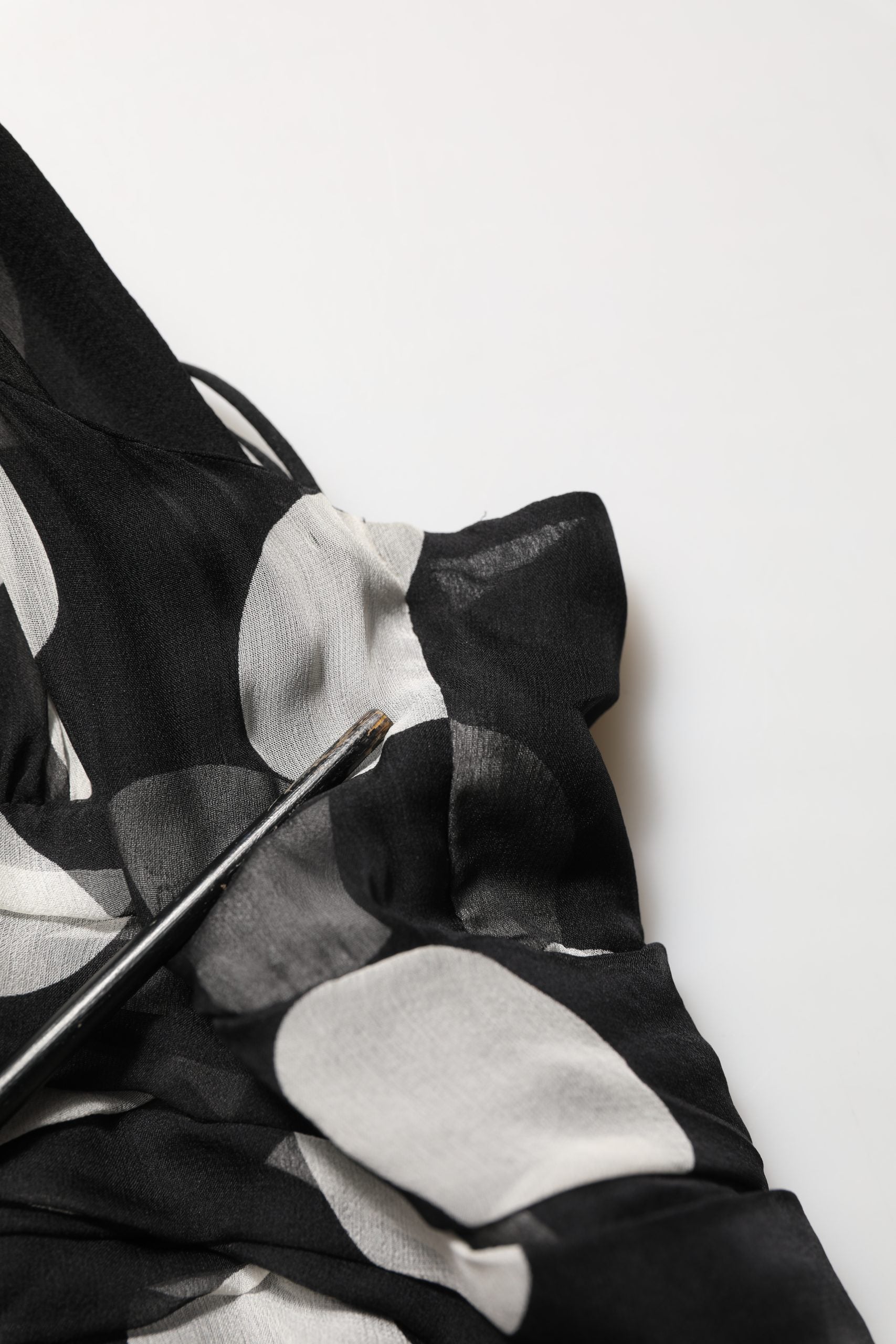 Indulge in the exquisite Dolce & Gabbana Black White Polka Dot Pleated Maxi Dress, a silk masterpiece that embodies timeless elegance and Italian craftsmanship for unforgettable moments.