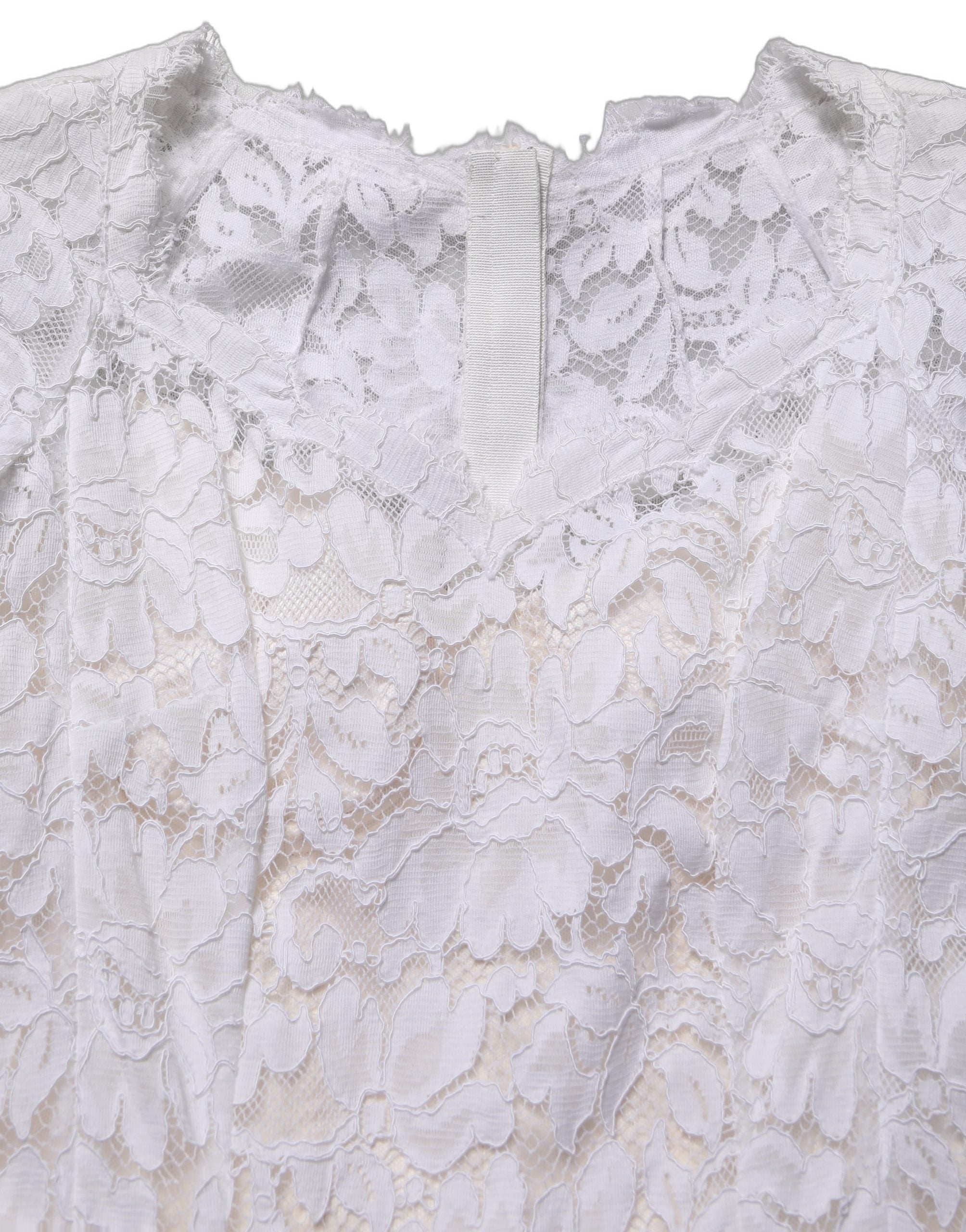 Experience the exquisite allure of the Dolce & Gabbana White Floral Lace Mermaid Long Gown, a timeless masterpiece crafted in Italy, embodying luxury and elegance.