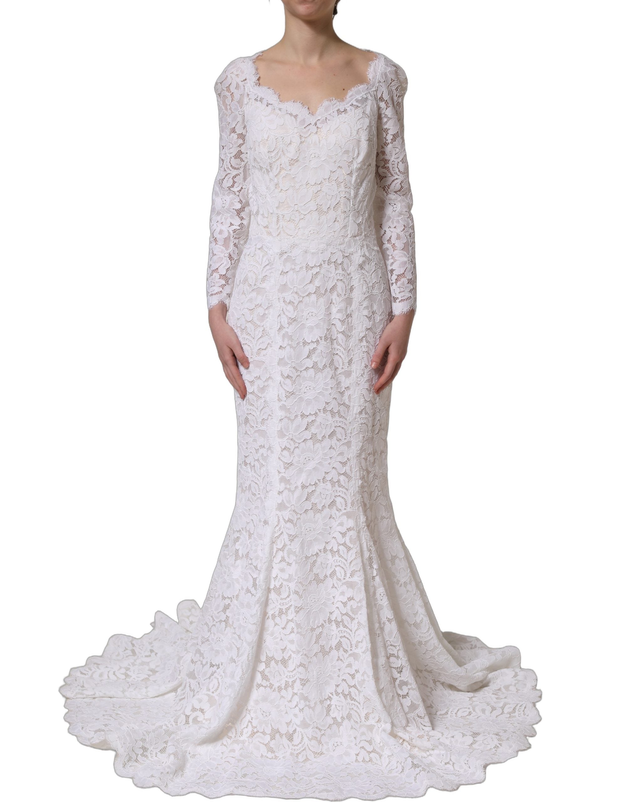 Experience the allure of the Dolce & Gabbana White Floral Lace Mermaid Long Gown, a testament to exquisite craftsmanship and timeless elegance, perfect for unforgettable moments.