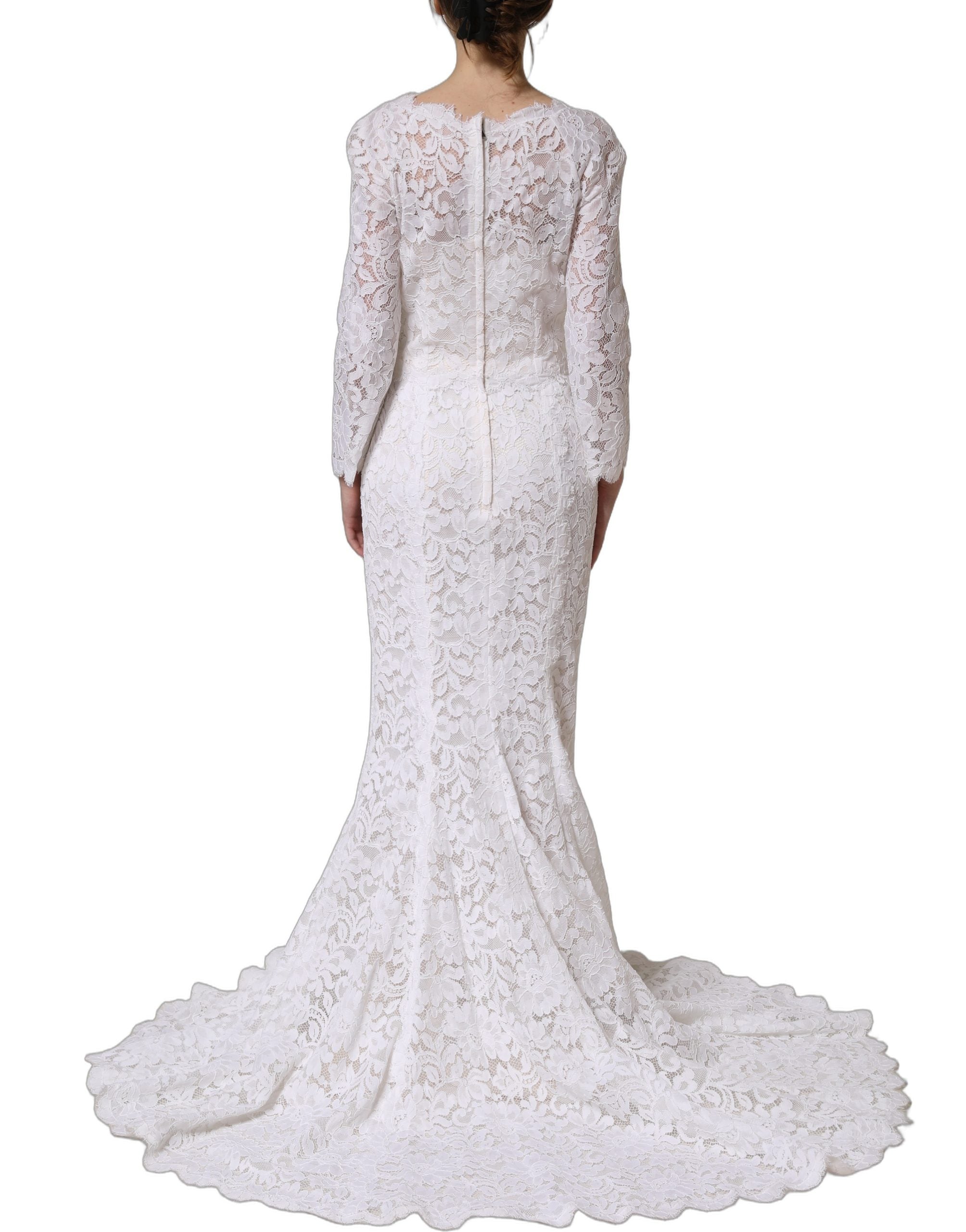 Experience the exquisite allure of the Dolce & Gabbana White Floral Lace Mermaid Long Gown, a timeless masterpiece of luxury and craftsmanship, perfect for unforgettable moments.