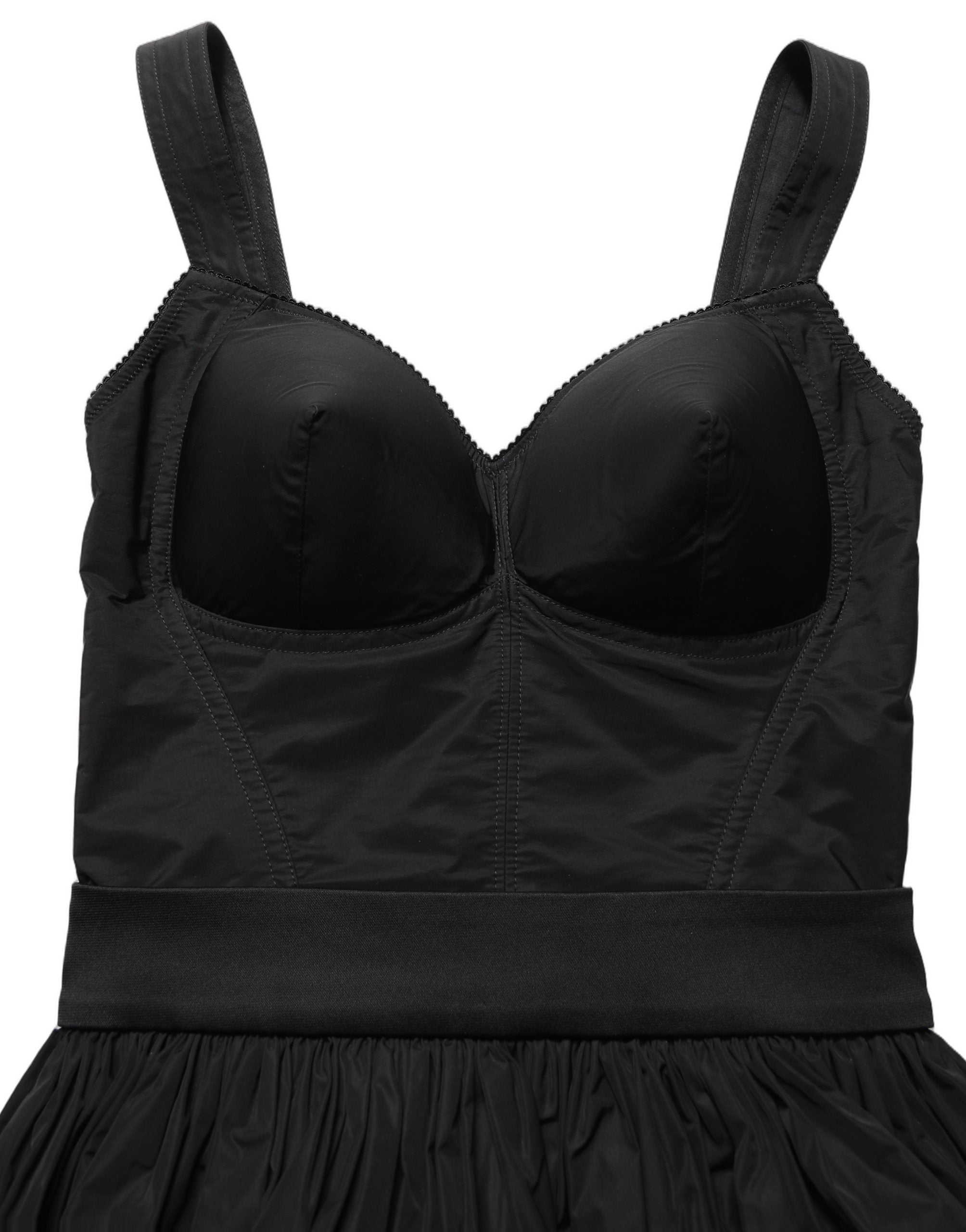 Indulge in the exquisite Dolce & Gabbana Black Nylon A-Line Sleeveless Mini Dress, a masterpiece of Italian craftsmanship that elevates your elegance for unforgettable evenings.