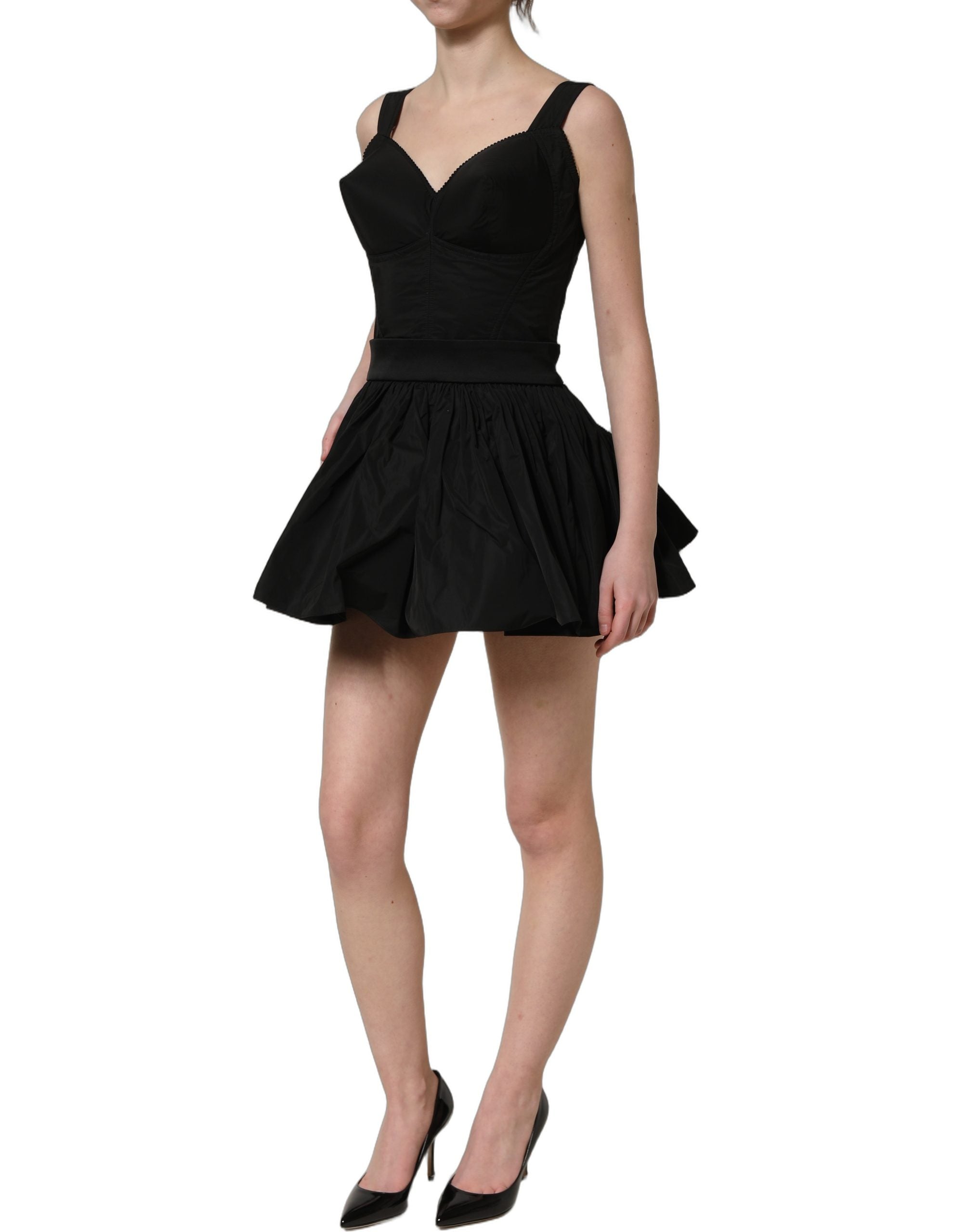 Indulge in the Dolce & Gabbana Black Nylon A-Line Mini Dress, a masterpiece of Italian craftsmanship, perfect for sophisticated evenings and timeless elegance.