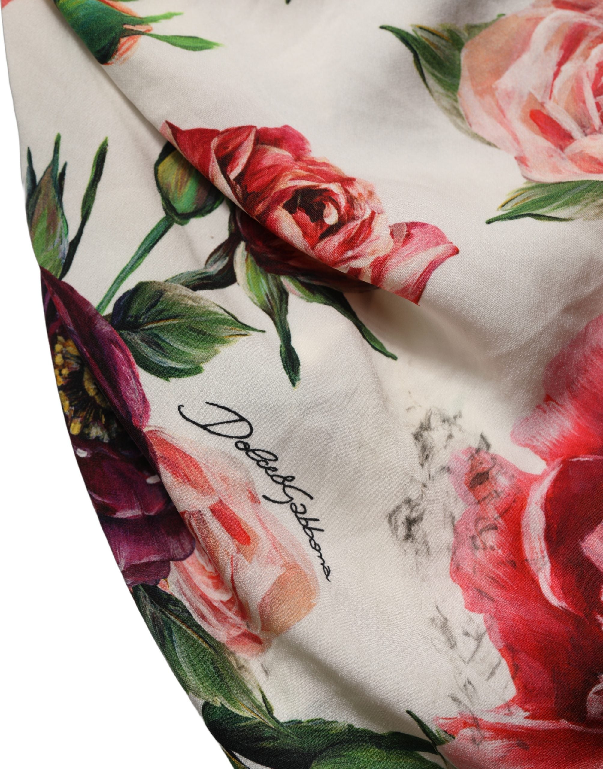 Experience the allure of Dolce & Gabbana's White Floral Sheath Mini Dress, a silk masterpiece that embodies timeless elegance and exquisite craftsmanship for unforgettable moments.