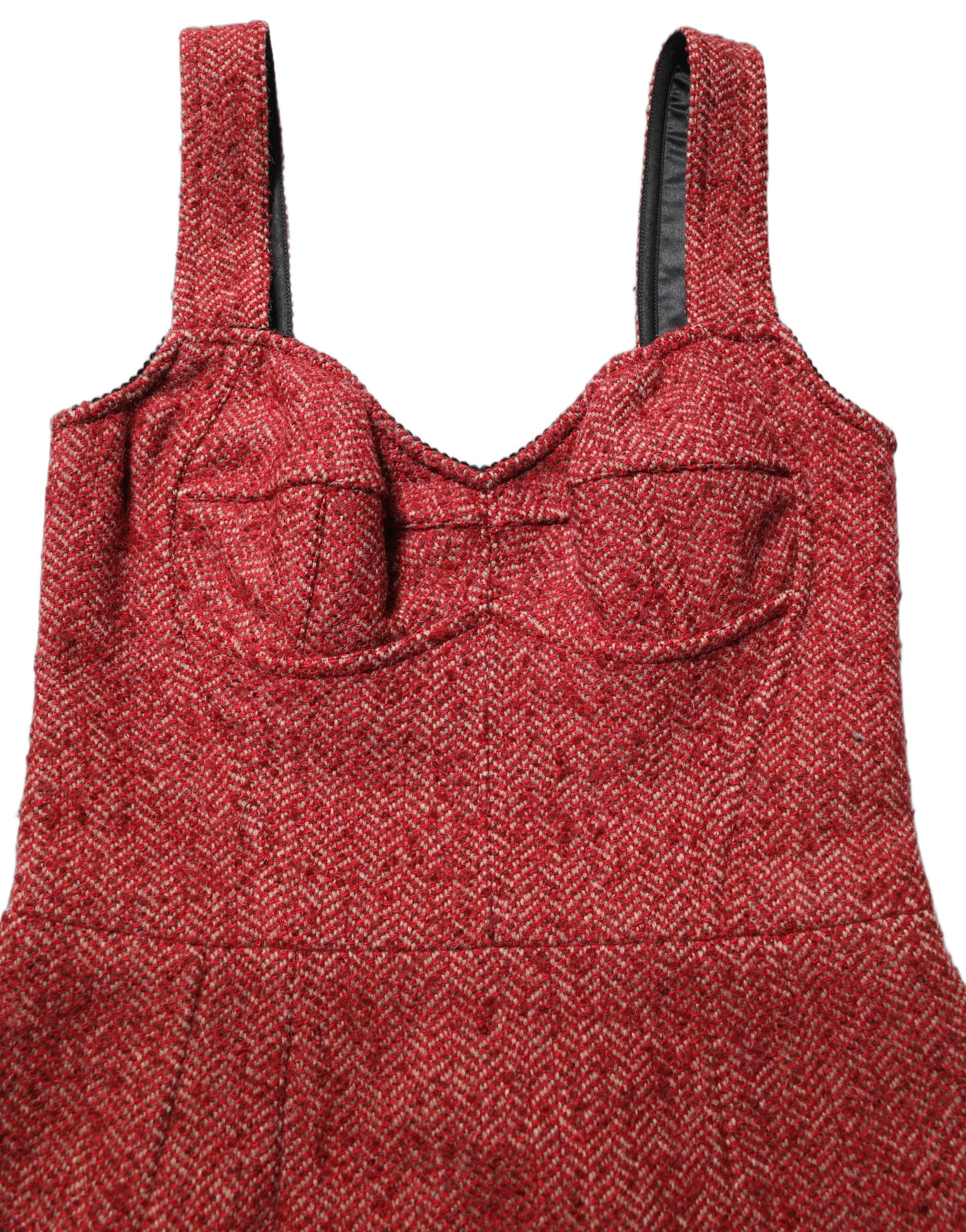 Experience the allure of Dolce & Gabbana's Multicolor Tweed Belted Babydoll Mini Dress, a masterpiece of Italian craftsmanship that embodies timeless elegance and sophistication.