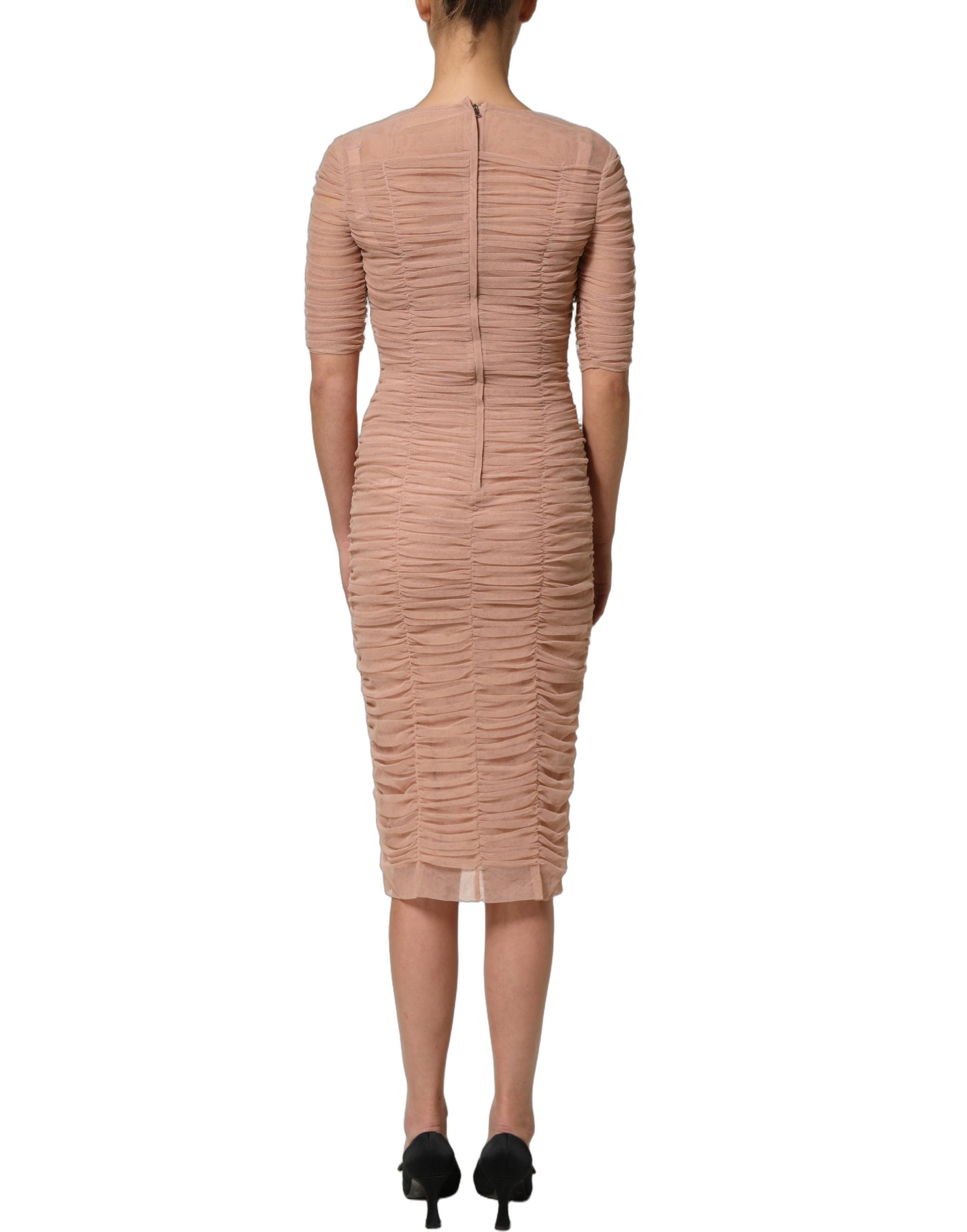 Elevate your elegance with the Dolce & Gabbana Beige Cotton Mesh Ruched Sheath Midi Dress, a masterpiece of Italian craftsmanship that embodies timeless sophistication.