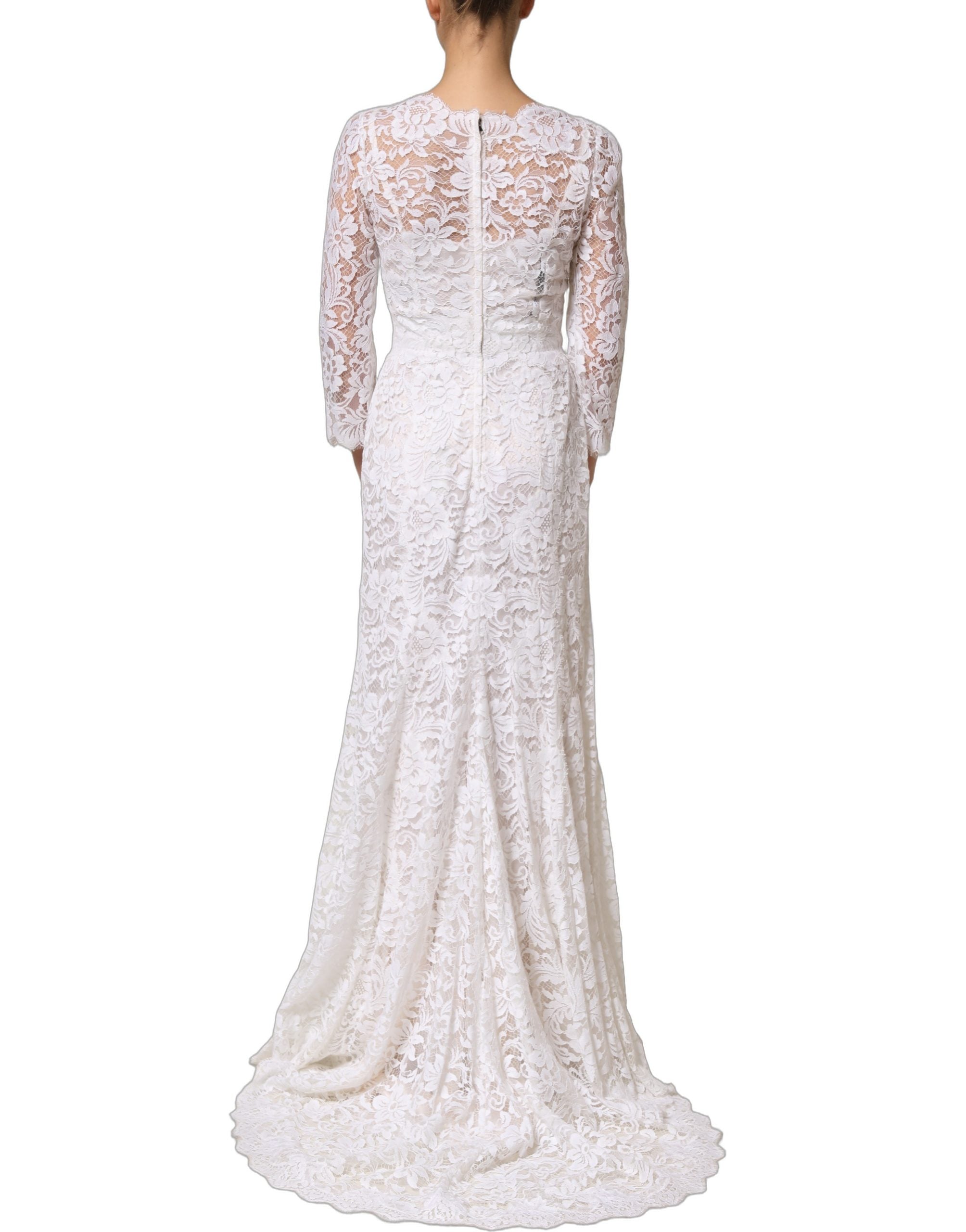 Experience the allure of the Dolce & Gabbana White Cotton Floral Lace Long Gown, a masterpiece of Italian craftsmanship that embodies timeless elegance and sophistication.