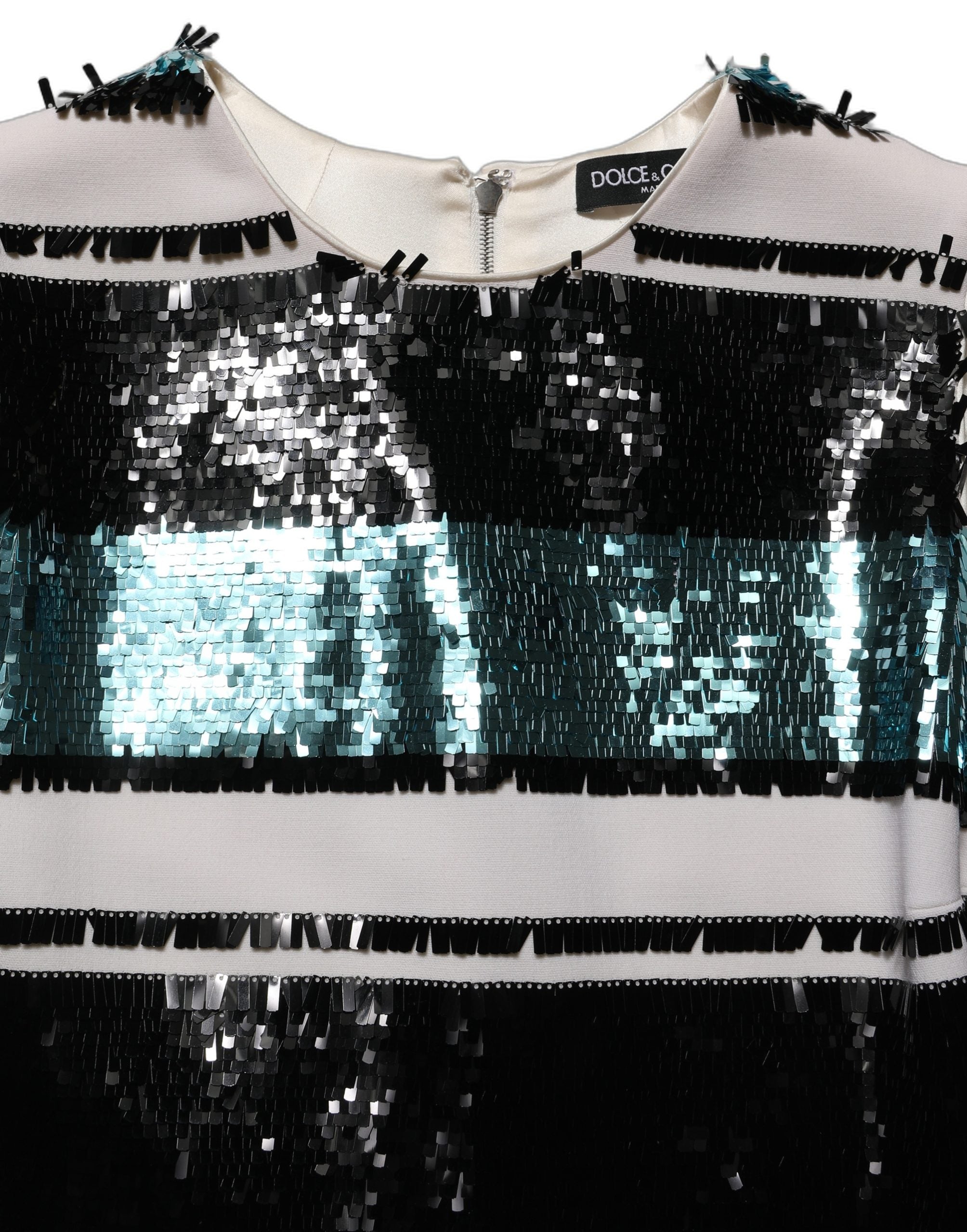 Discover the exquisite allure of the Dolce & Gabbana Multicolor Sequined Sleeveless Shift Dress, a masterpiece of Italian craftsmanship that embodies elegance and luxury.