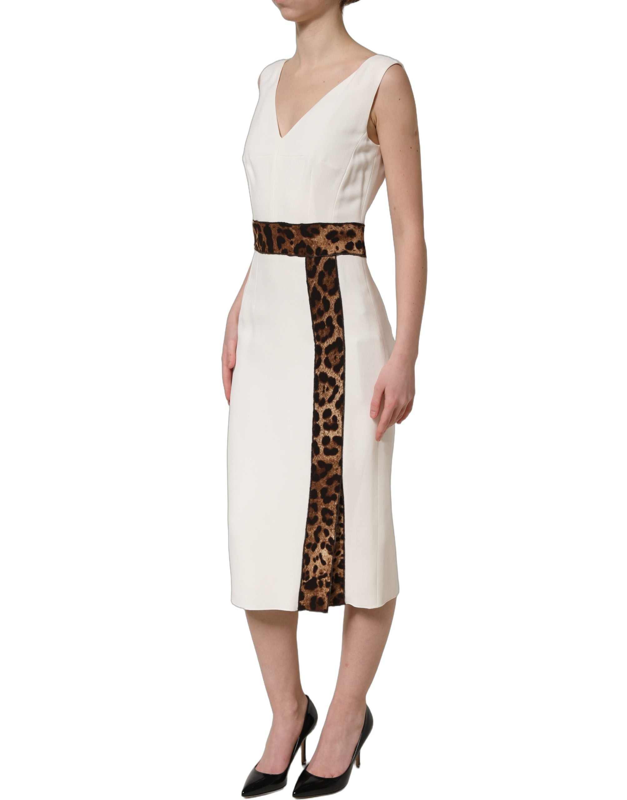 Experience the epitome of luxury with the Dolce & Gabbana White Leopard Sleeveless Sheath Midi Dress, a masterpiece of exquisite materials and Italian craftsmanship, perfect for unforgettable evenings.
