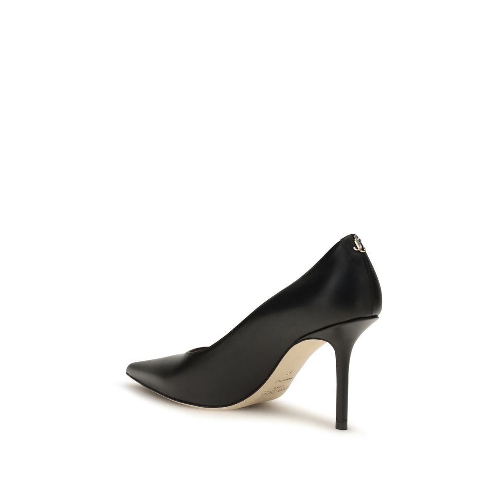 Experience the allure of Jimmy Choo's Love 85 Pumps, handcrafted from luxurious calf leather, embodying timeless elegance and sophistication for the discerning individual.