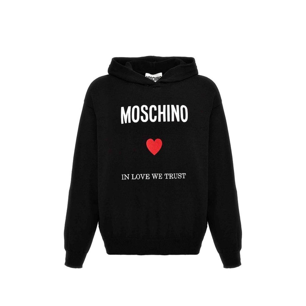Indulge in the Moschino Couture Black Cotton Sweatshirt, a masterpiece of 100% cotton luxury, blending sophisticated style with effortless comfort for the discerning individual.