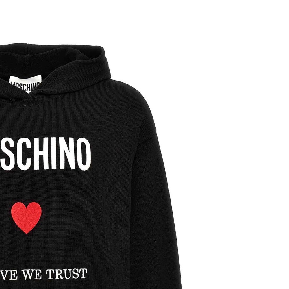 Elevate your style with the Moschino Couture Black Cotton Sweatshirt, a luxurious blend of comfort and sophistication, perfect for the discerning individual.