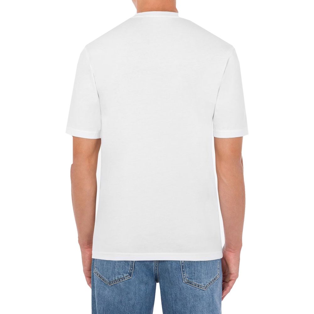 Elevate your wardrobe with the Moschino White Cotton T-Shirt, a luxurious essential crafted from premium cotton, embodying timeless sophistication and effortless style.