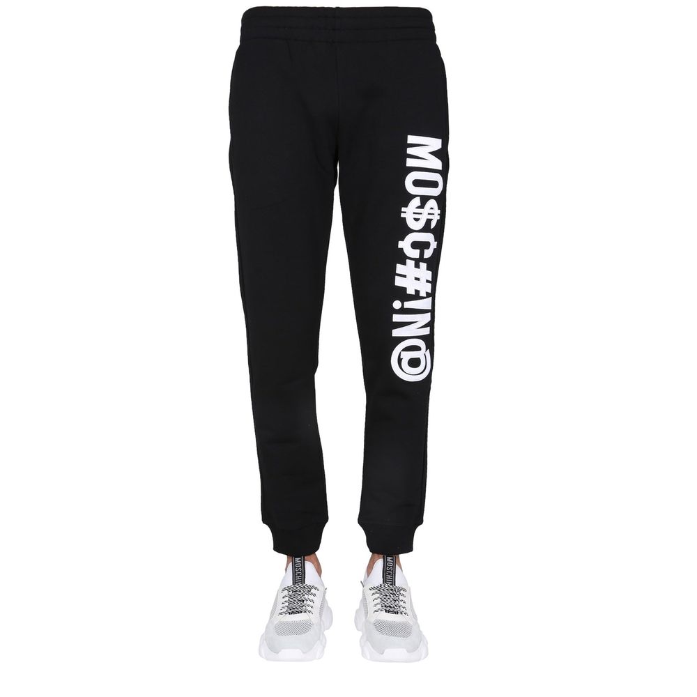Experience the allure of Moschino Couture Black Cotton Joggers, crafted from luxurious cotton, embodying elegance and sophistication for the discerning individual.