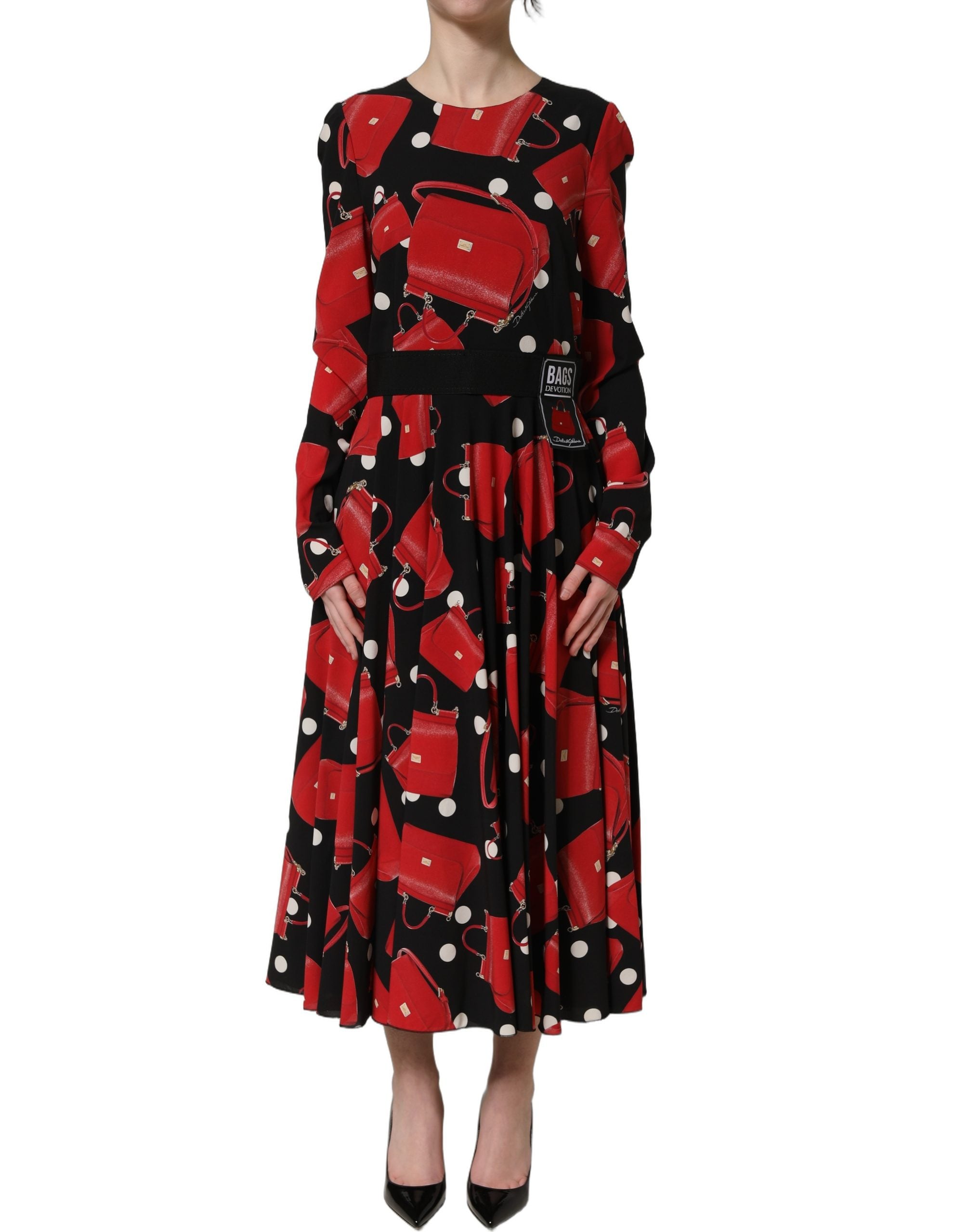 Experience the allure of Dolce & Gabbana's Black Handbag Print Long Sleeve Midi Dress, crafted from luxurious silk for an exquisite blend of elegance and sophistication.