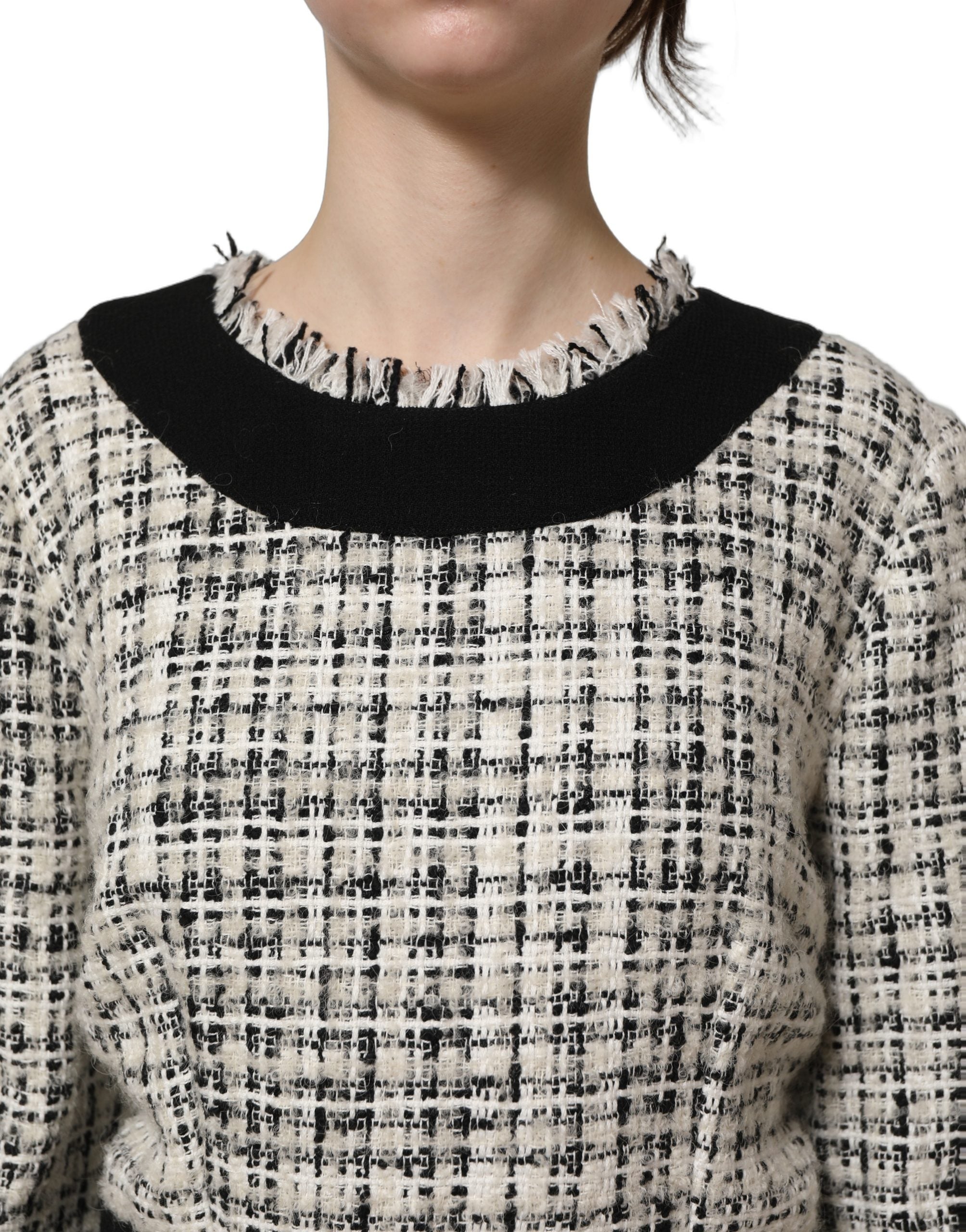Elevate your wardrobe with the Dolce & Gabbana Multicolor Bouclé Tweed Midi Dress, a masterpiece of Italian craftsmanship that embodies luxury and timeless elegance.