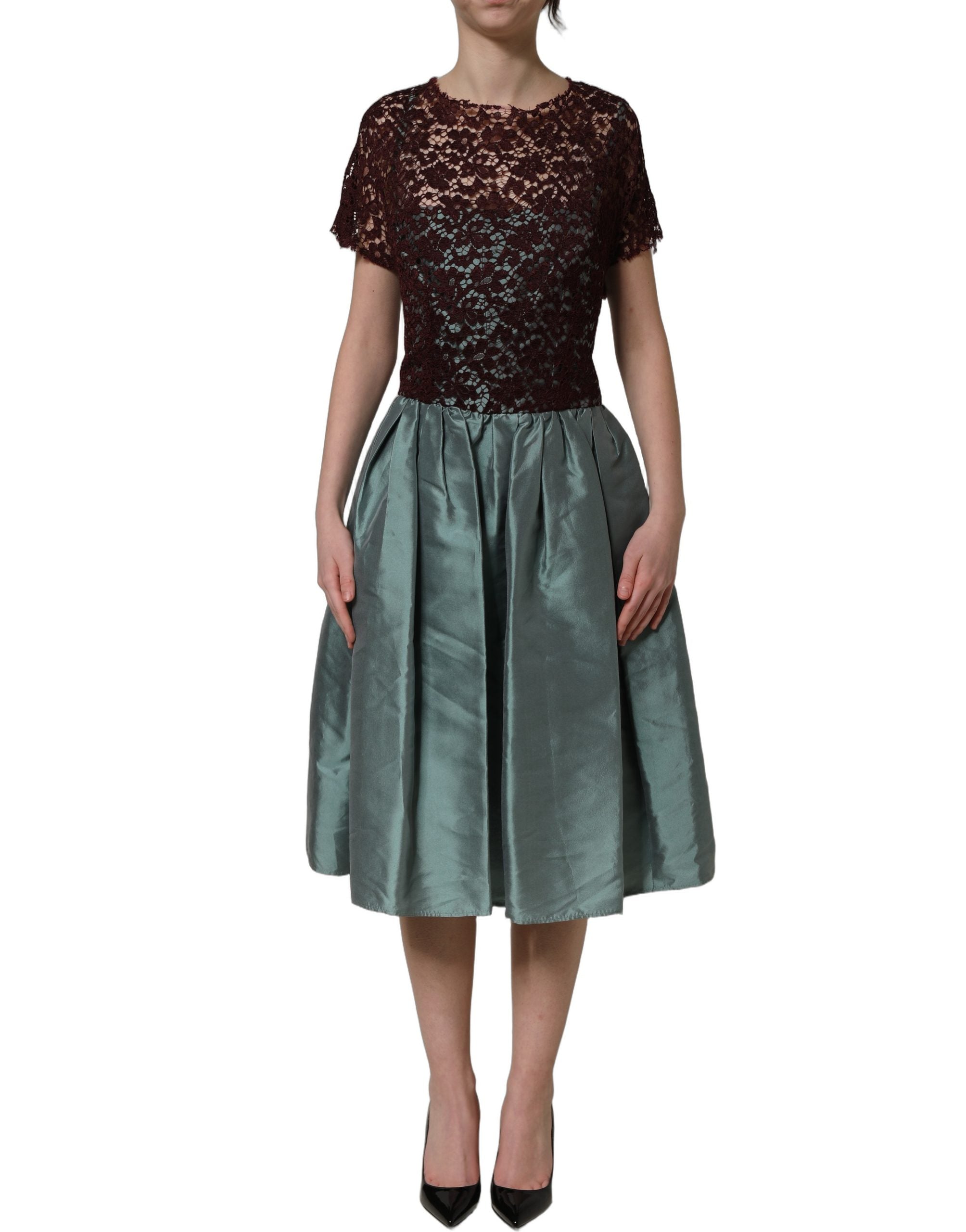 Discover the exquisite Dolce & Gabbana Multicolor Floral Lace Taffeta Pleated Midi Dress, a masterpiece of Italian craftsmanship that embodies timeless elegance and allure.