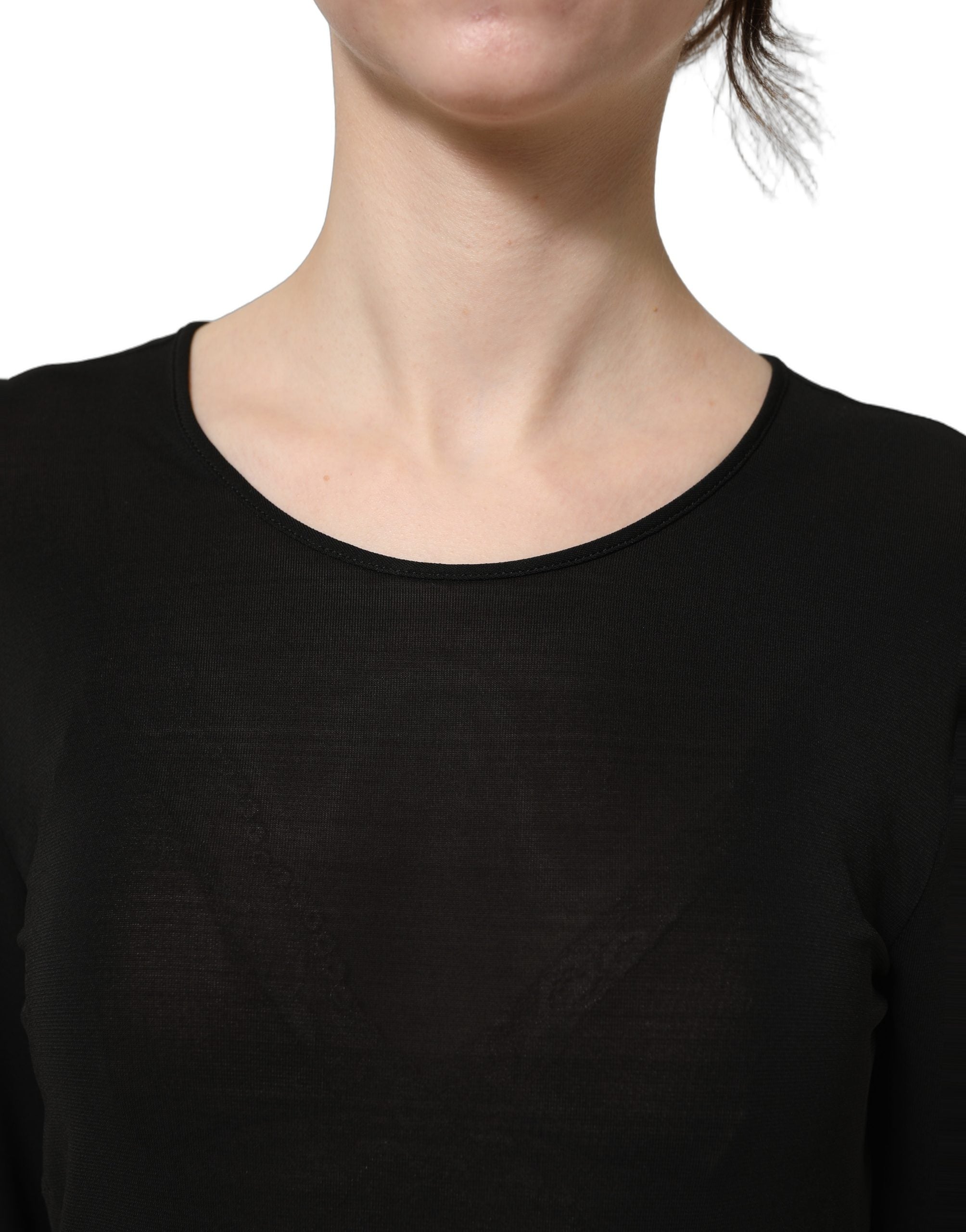 Discover the exquisite Dolce & Gabbana Black Cotton Long Sleeves Sheath Maxi Dress, a timeless embodiment of Italian craftsmanship and luxurious elegance for every discerning individual.
