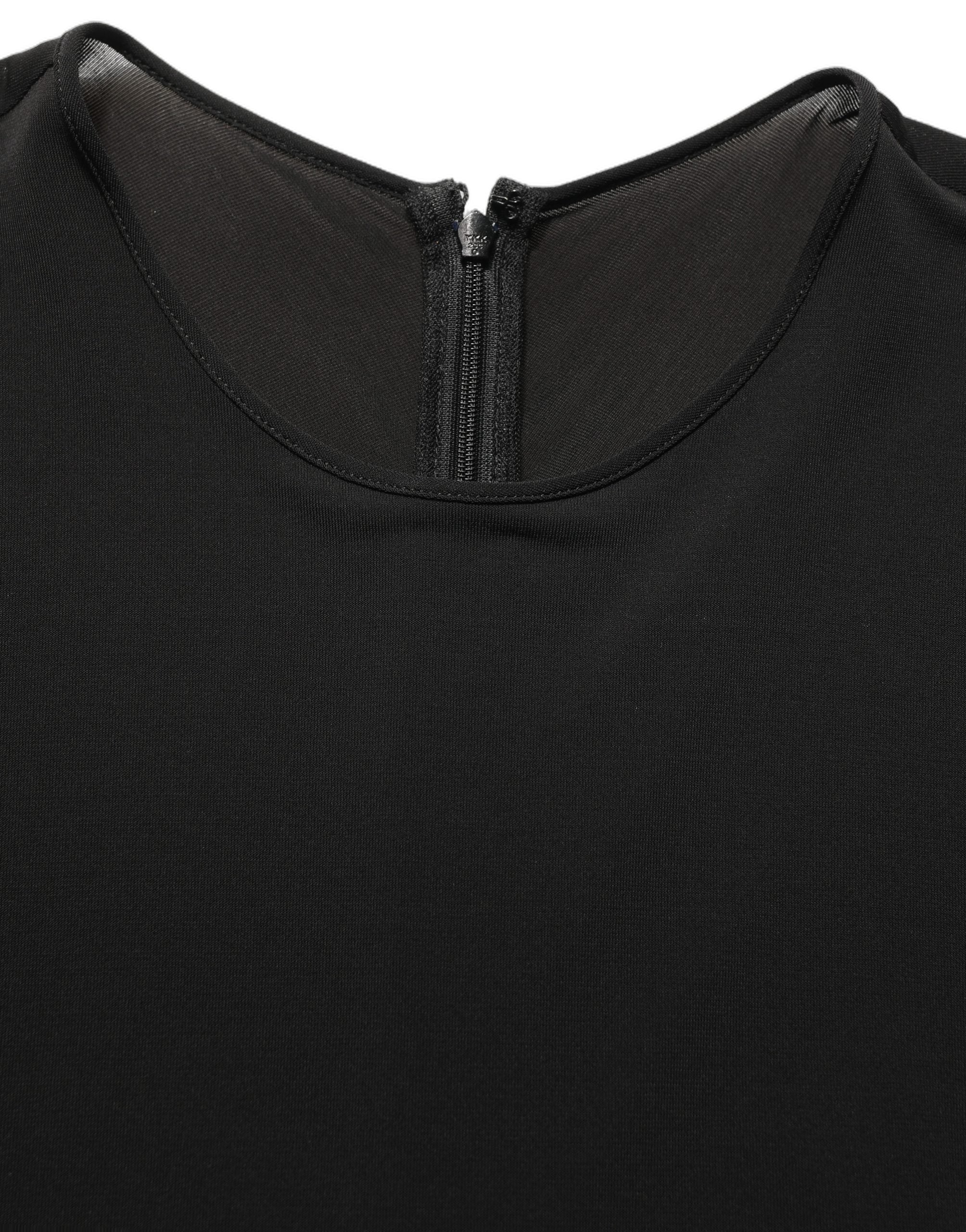Experience the allure of Dolce & Gabbana's Black Cotton Long Sleeves Sheath Maxi Dress, where exquisite Italian craftsmanship meets timeless elegance for unforgettable moments.
