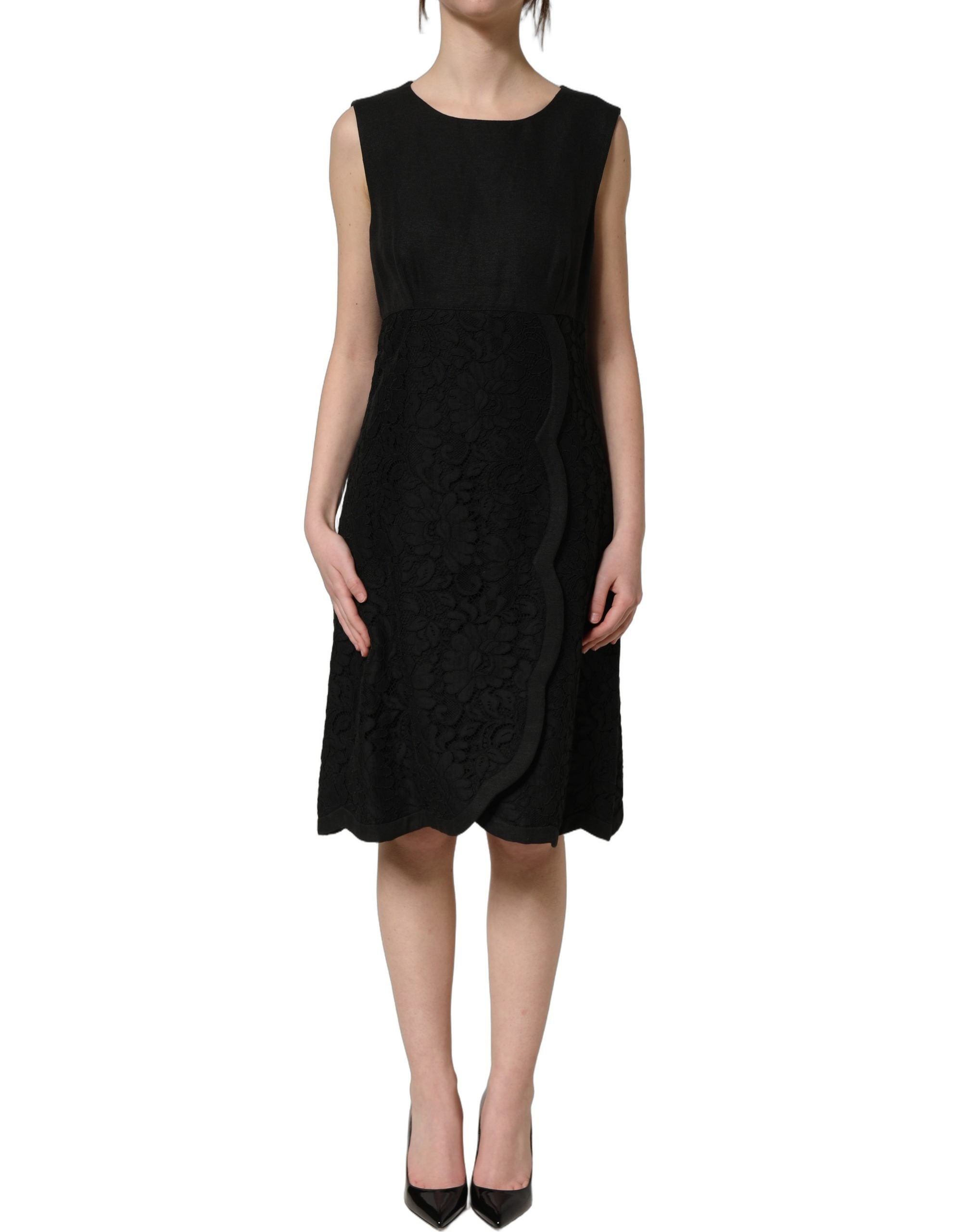 Experience the exquisite allure of the Dolce & Gabbana Black Floral Lace Sleeveless Shift Dress, a masterpiece of Italian craftsmanship that embodies timeless elegance and sophistication.