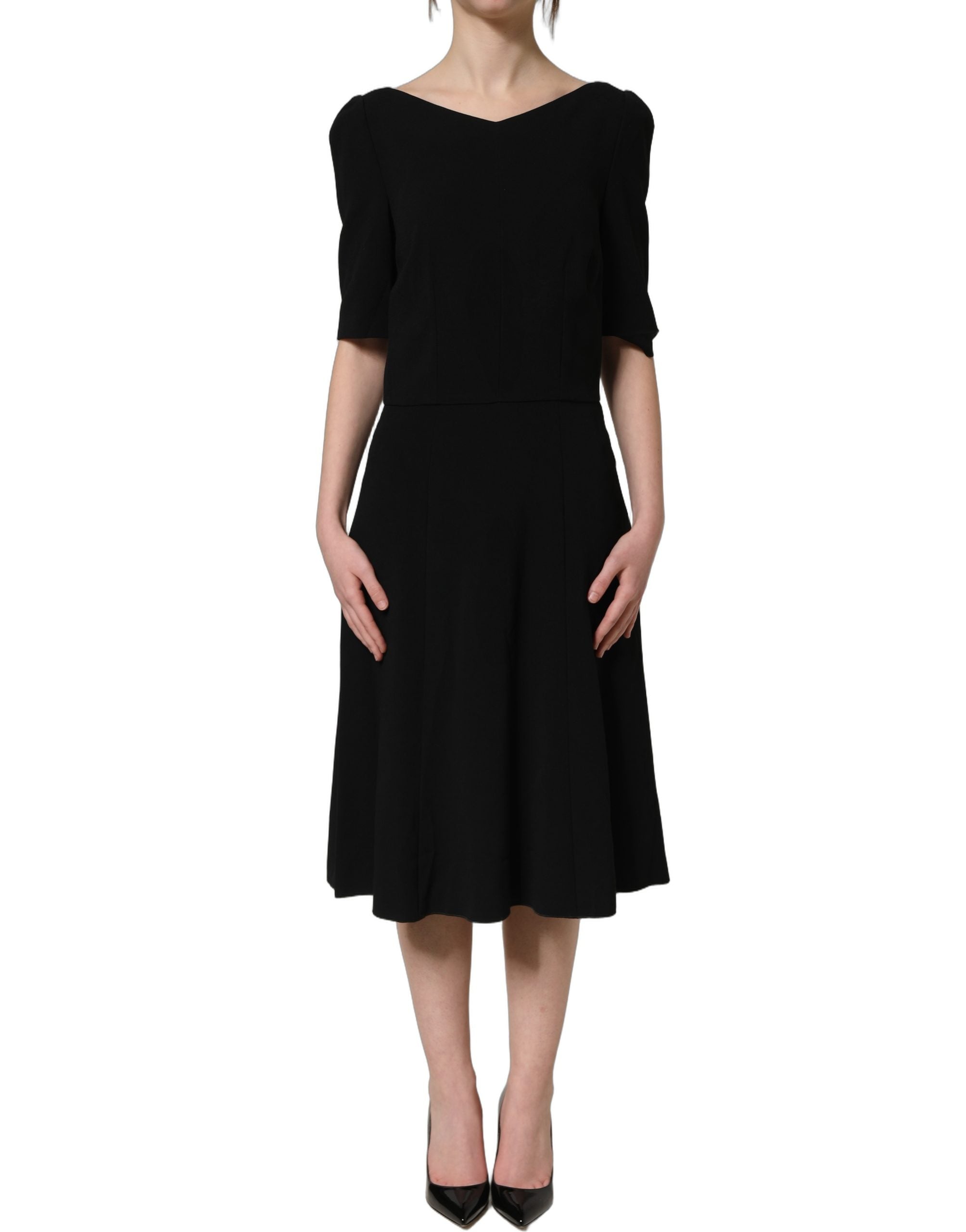 Experience the exquisite allure of Dolce & Gabbana's Black Viscose Short Sleeve A-line Midi Dress, where luxurious fabrics and meticulous craftsmanship redefine elegance.